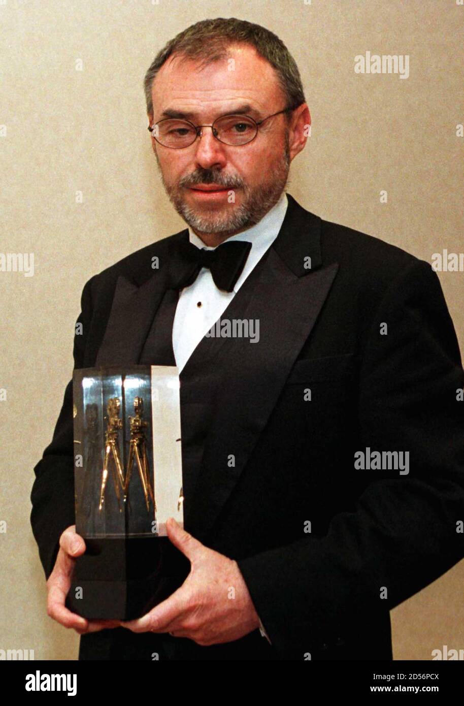 Cinematographer John Toll poses with his American Society of Cinematographers award at the 13th annual Awards for Outstanding Achievement in Cinematography Feburary 21, in Los Angeles. Toll is being honored for his graphically visual rendition of 'The Thin Red Line'.  CFM/ME Stock Photo