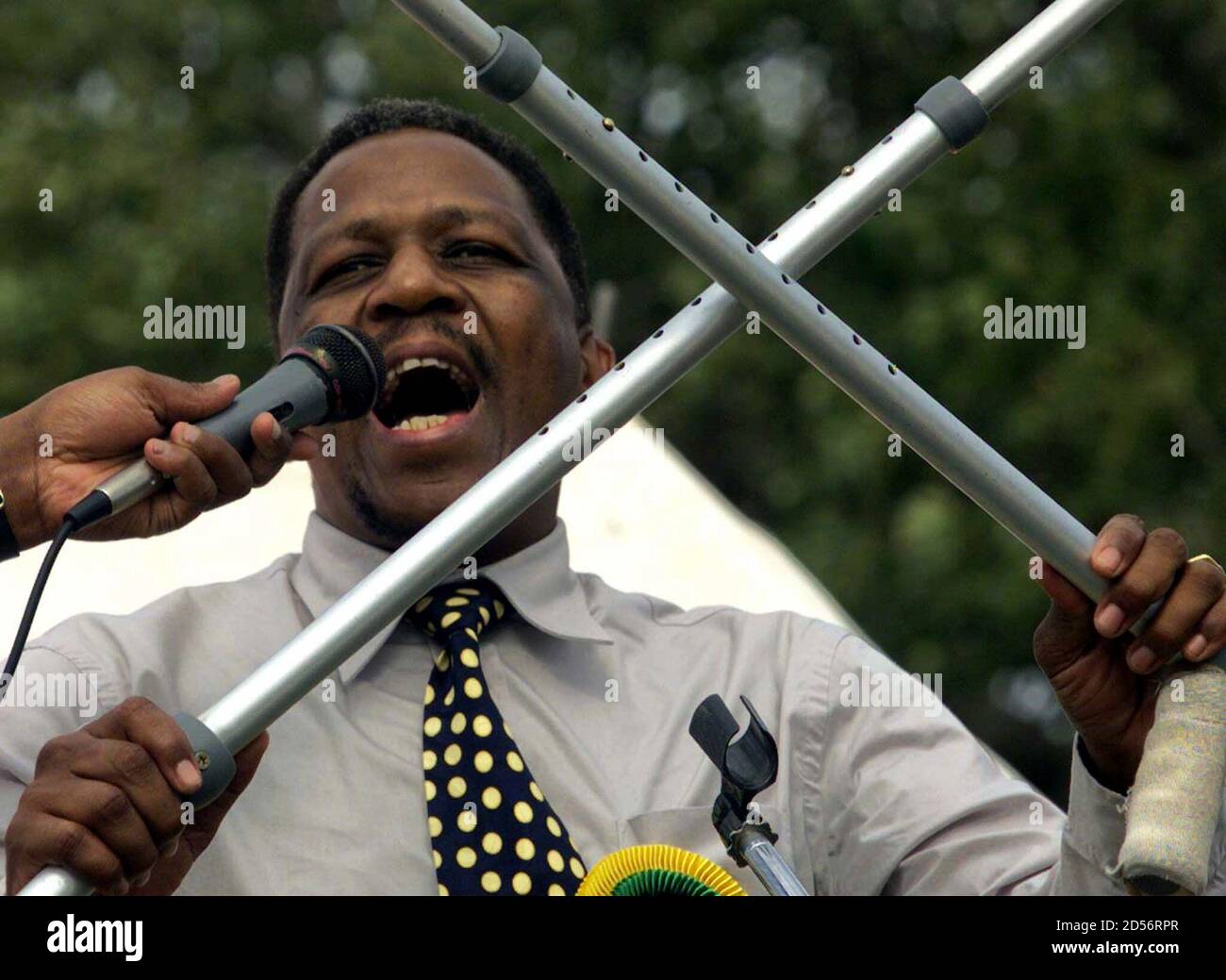 Mpumalanga Province premier Matthews Phosa urges supporters of the African National Congress (ANC) to put a cross next to [Mbeki]'s face on June 2 during an election campaign rally in a township May 22. [Mbeki], due to succeed retiring President [Nelson Mandela], vowed to fight corruption by government officials in his administration if he is made president. The ANC is expected to win the election overwhelmingly. Stock Photo