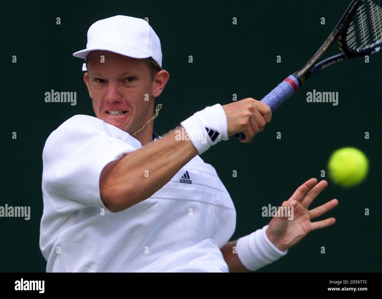 Sweden's Thomas Johansson hits a forehand return to Richey Reneberg of the  U.S. during their first round match at the Wimbledon Tennis Championships  June 21. Johansson is currently ranked number 21 in