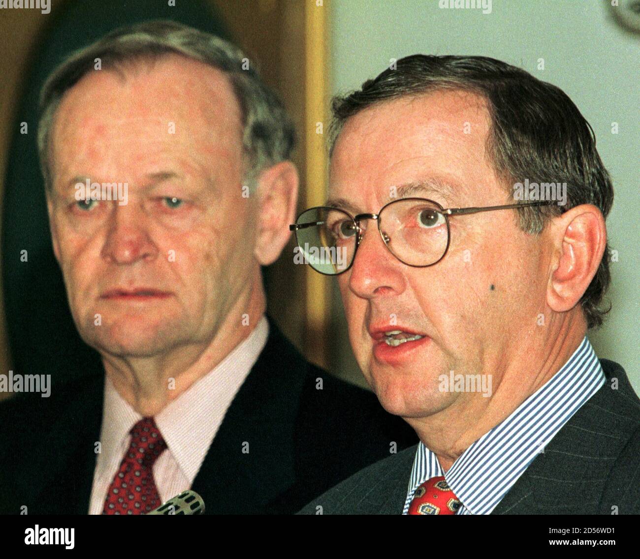 J. Bernard Boudreau (R) speaks at a news conference with Canadian Prime  Minister Jean Chretien (L) after Boudreau was sworn into the federal  cabinet at a ceremony at Rideau Hall in Ottawa,