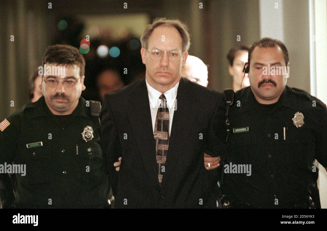This is a file photo of suspected serial killer Robert Lee Yates Jr. (C)  being escorted by Spokane County Sheriff Deputies out of a Superior  courtroom in Spokane, Washington, May 31, 2000.