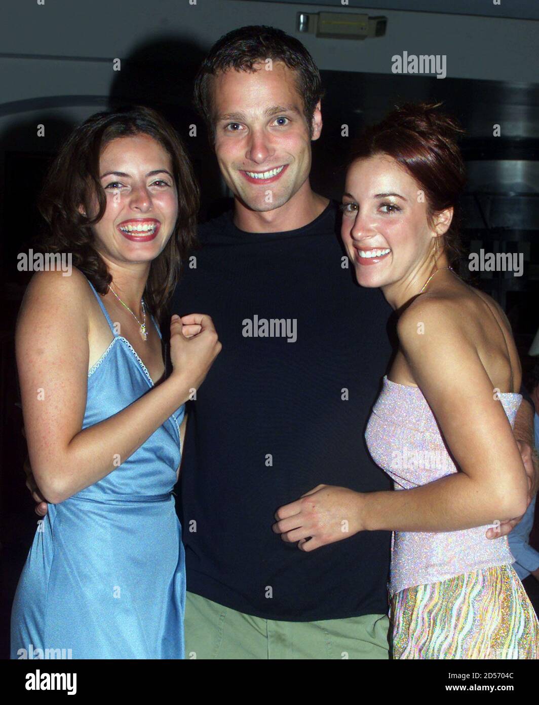 'Grosse Point' cast members Irene Molloy (L), Kohl Sudduth, and Lindsay Sloane (R) pose together during WB's Summer press tour party in Pasadena July 24, 2000. The comedy series takes a  behind-the-scenes  look at the actors in a ficticious prime time melodrama. The party introduced the stars of WB's fall televison season to television writers from around the United States. Stock Photo