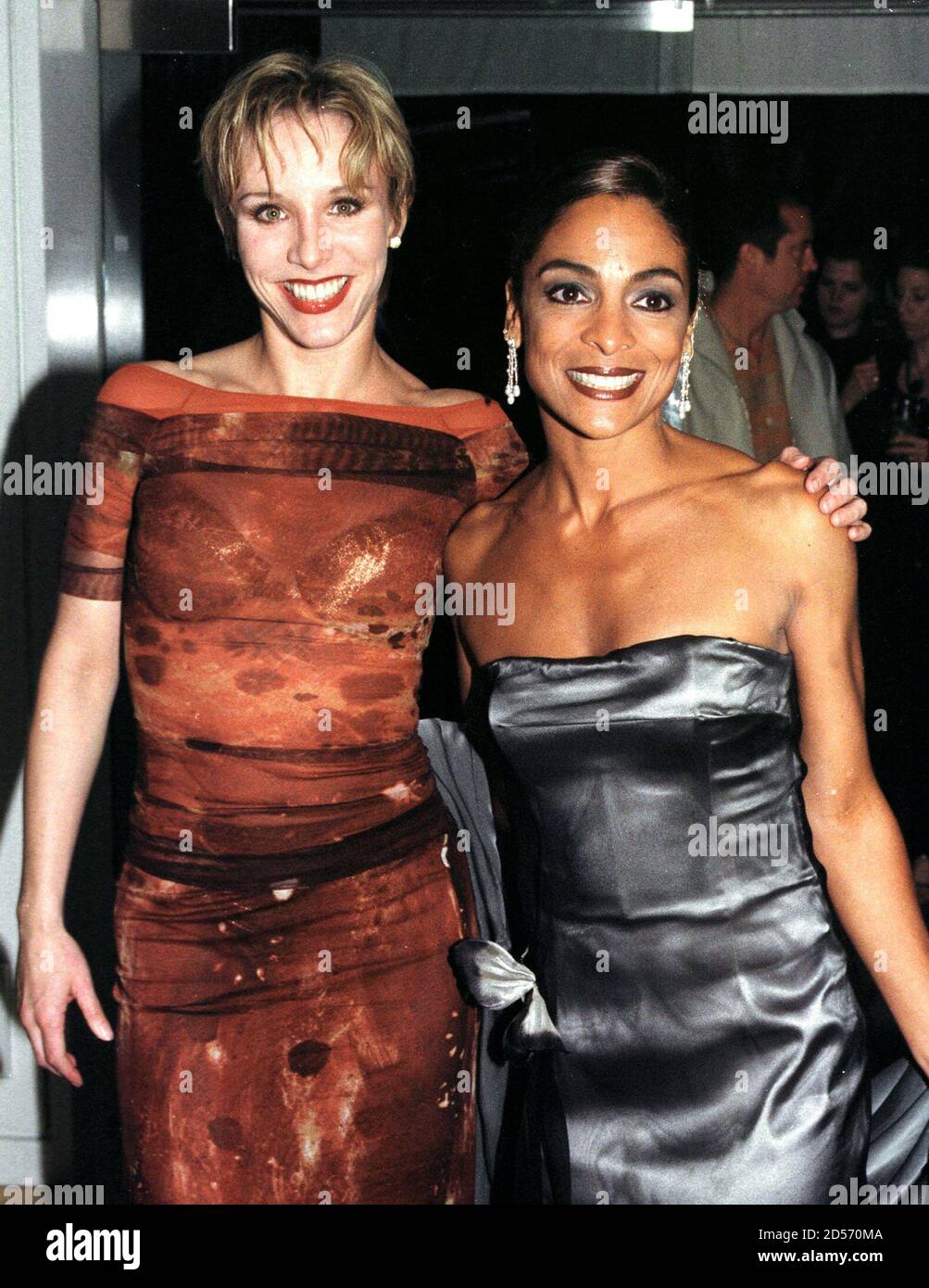 Actresses Charlotte d'Amboise (L) and Jasmine Guy, stars of the musical play 'Chicago' pose at the party following the premiere performance of the play 'Chicago' as it opens its Los Angles run May 6 at the Ahmanson Theater in Los Angeles. Stock Photo