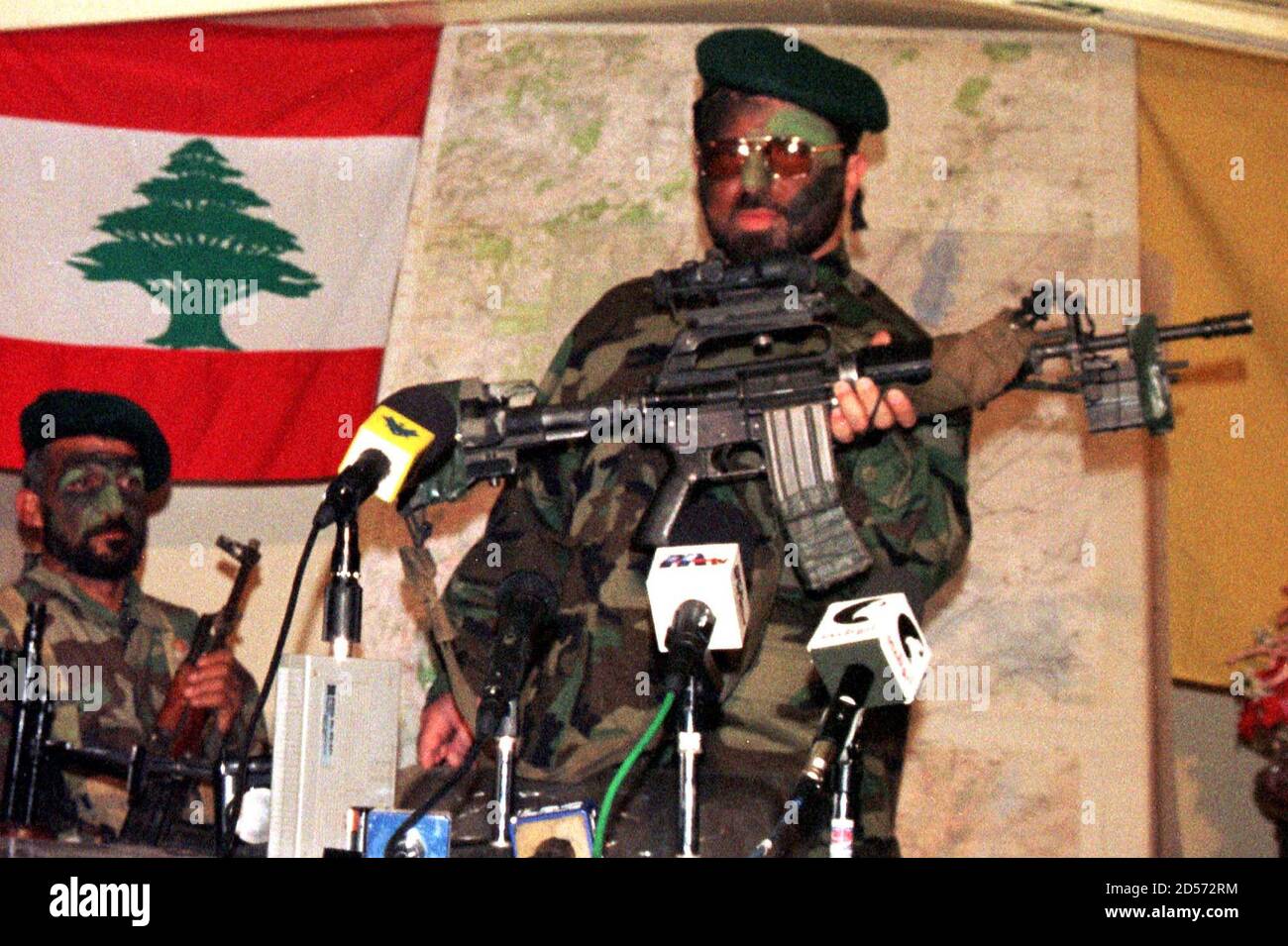 A Pro-Iranian Hizbollah geurrilla who staged the attack on the Israeli patrol February 23 shows reporters an M18 rifle bilonging to one of the dead Israeli officers, during a news conference held at a mountain cave less than five kms (miles) away from Berkit Jabour, in the Bekaa valley. The guerrillas killed three Israeli officers and wounded five other soldiers in fierce clashes overnight, a source in Israel's South Lebanon Army (SLA) proxy said on Tuesday. JS/FMS Stock Photo