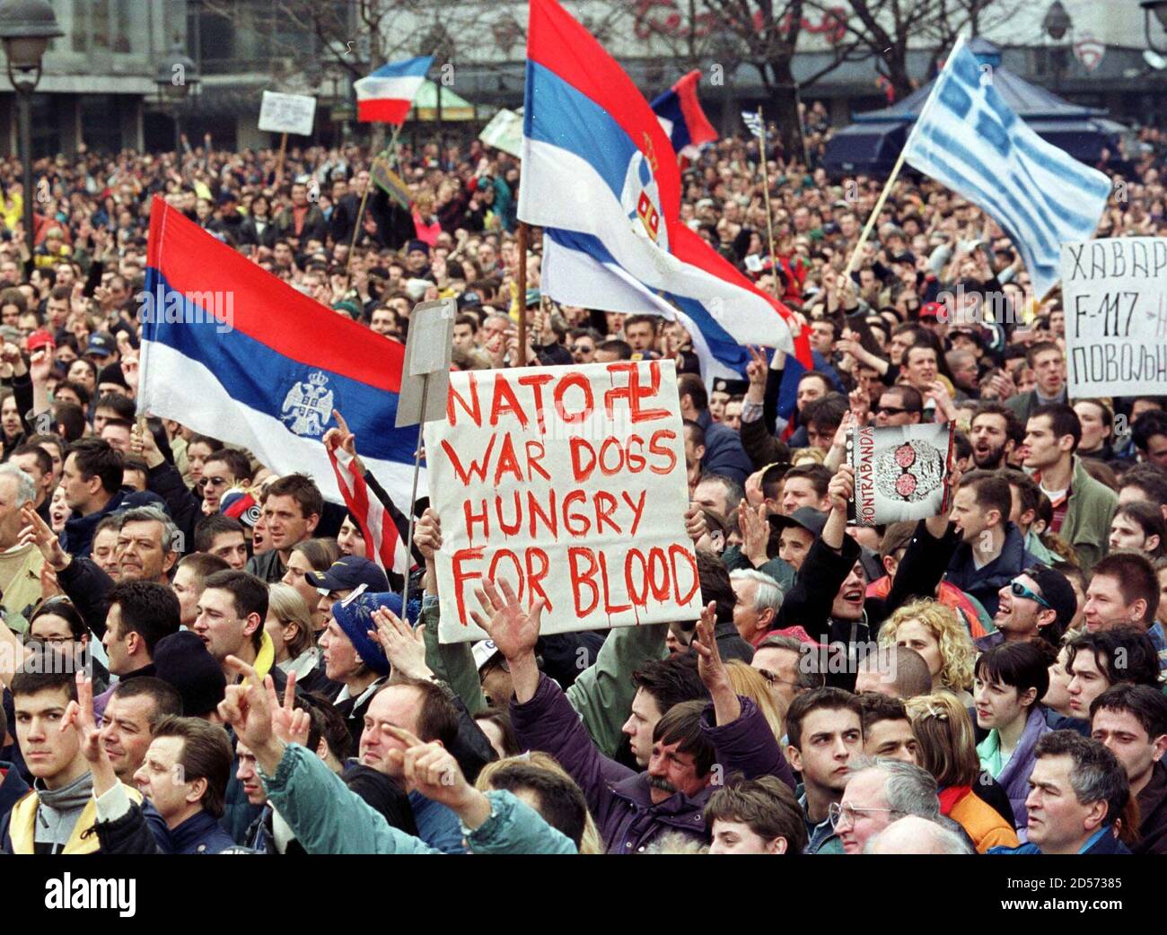 Belgraders Wave Flags And Banners During A Protest Against NATO ...