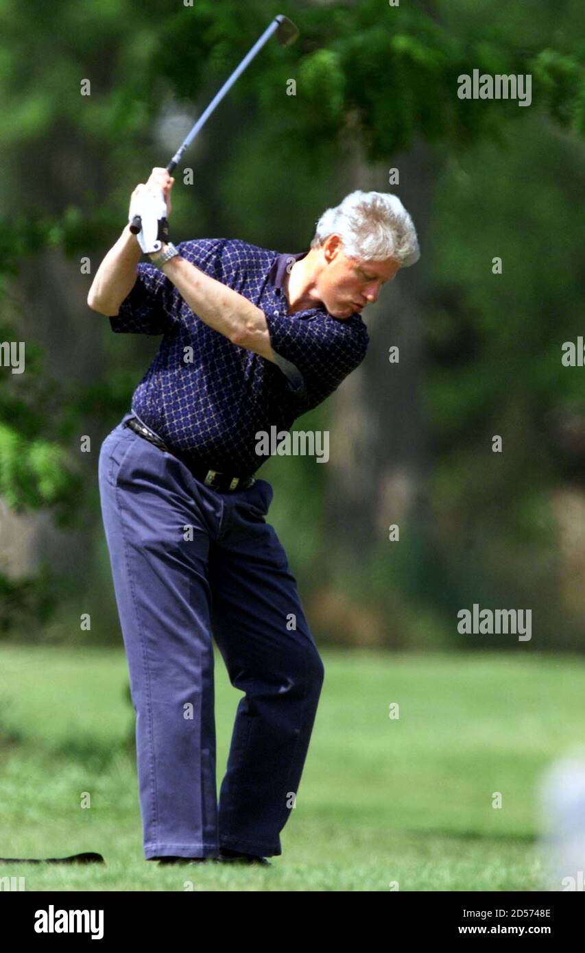 U.S. President Bill Clinton tees off at the driving range at the Black Rock Golf  Course, June 6. President Clinton arrived at Camp David Saturday and plans  to return to Washington late