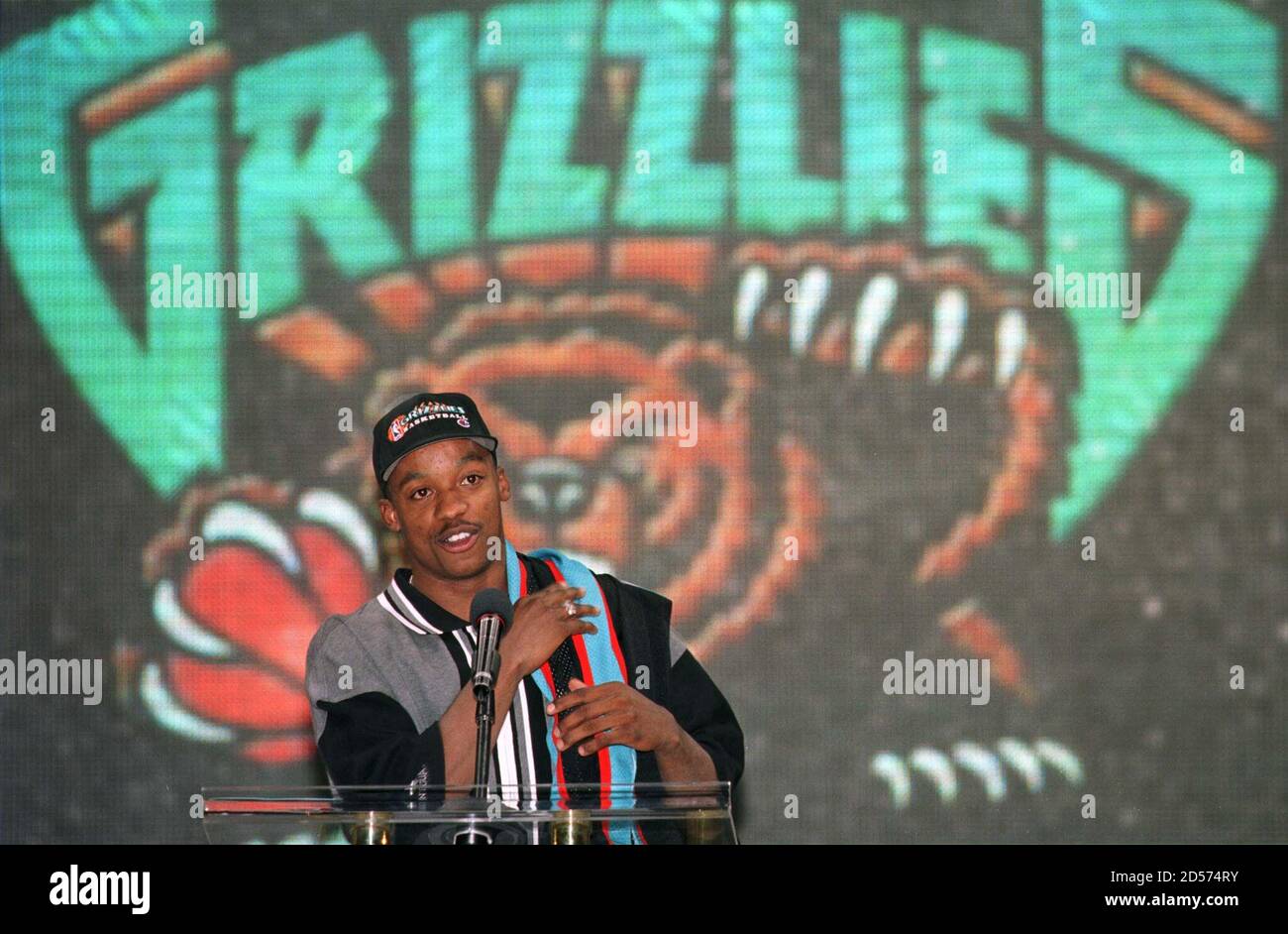 The Vancouver Grizzlies Steve Francis drapes his jersey over his shoulder  as he faces the media at a press conference in Vancouver July 21. Francis,  the Grizzlies number one draft pick and