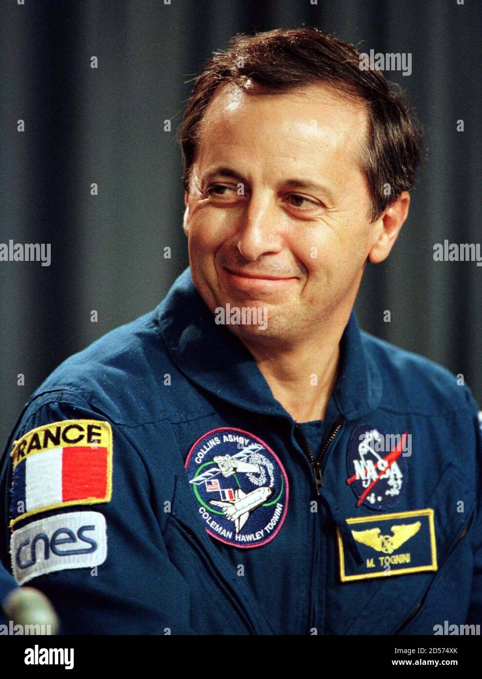 French Space shuttle Columbia astronaut Michel Tognini appears at the post-landing press conference at the Kennedy Space CenterJuly 28. The Space Shuttle Columbia is back after a five-day mission to deploy the Chandra X-Ray Observatory.  CWL/RC Stock Photo