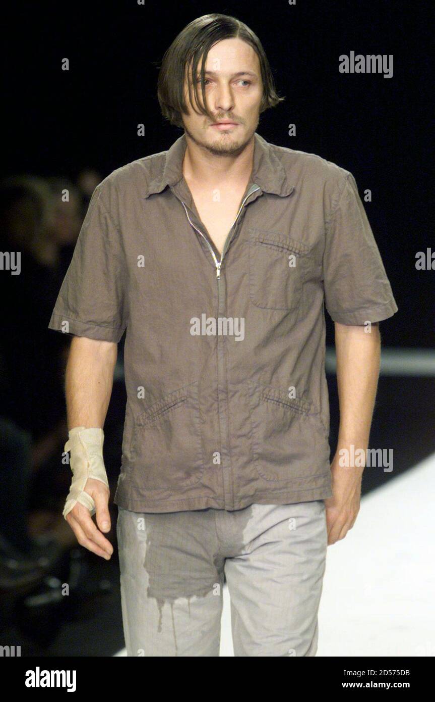 A Male Model Wears Stained Trousers During The Show From High Street Designer Red Or Dead During The Second Day Of London Fashion Week September 21 The Week Attracts Famous Fashion Designers