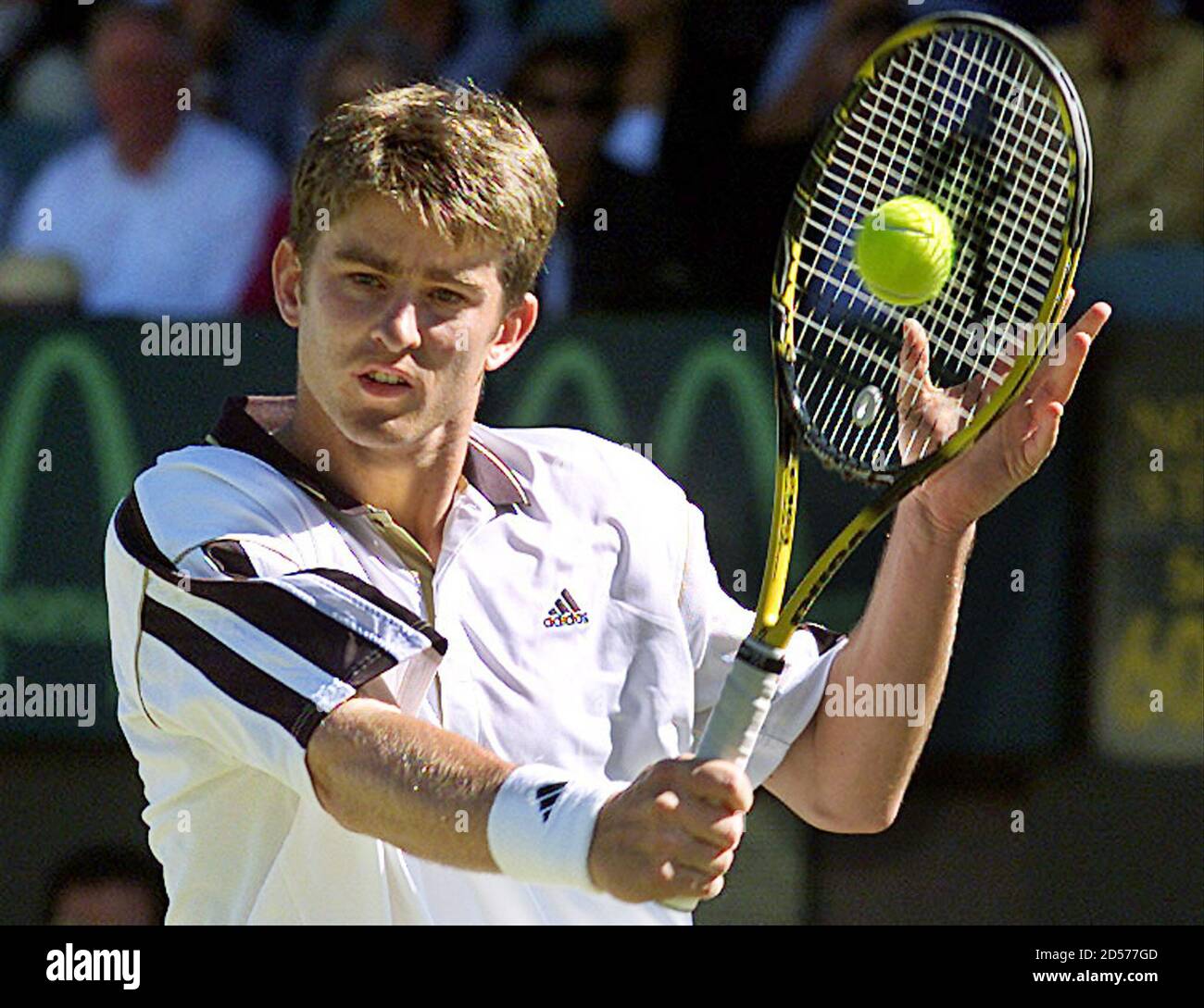 German Davis Cup team player Michael Kohlmann hits a backhand volley during  his singles match against Australia's Lleyton Hewitt at Adelaide's Memorial Drive  tennis courts April 7. Hewitt won 6-1 in the