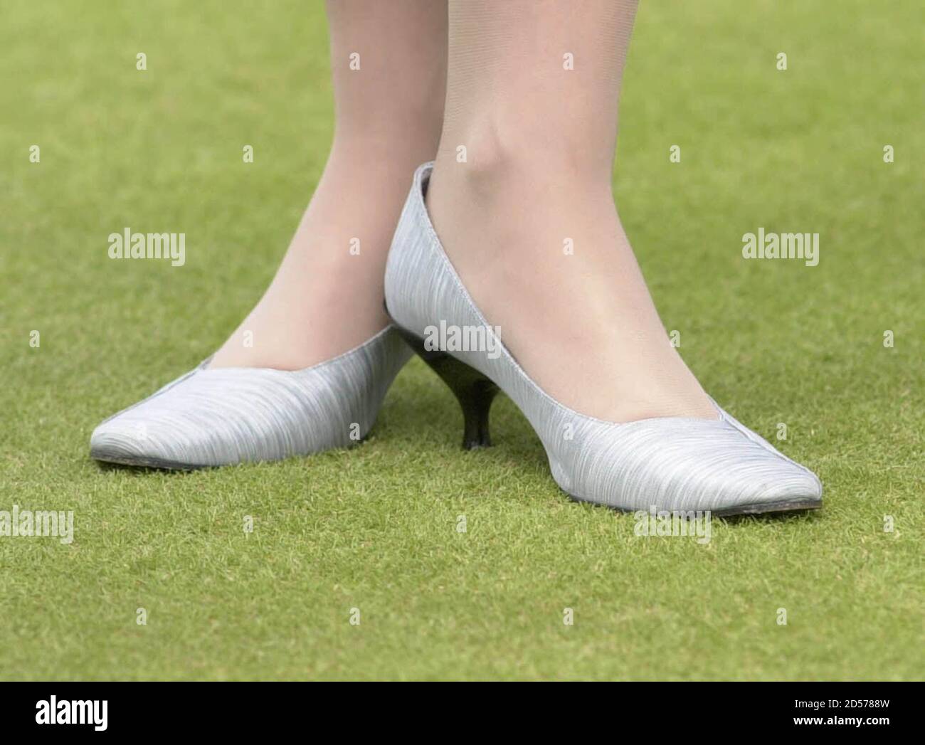 Sophie, The Countess of Wessex wears inappropriate shoes she tries her hand at bowling at Taunton Deane Bowling Club July 8. The Duke and Duchess of Wessex opened the new bowling green.  PS Stock Photo