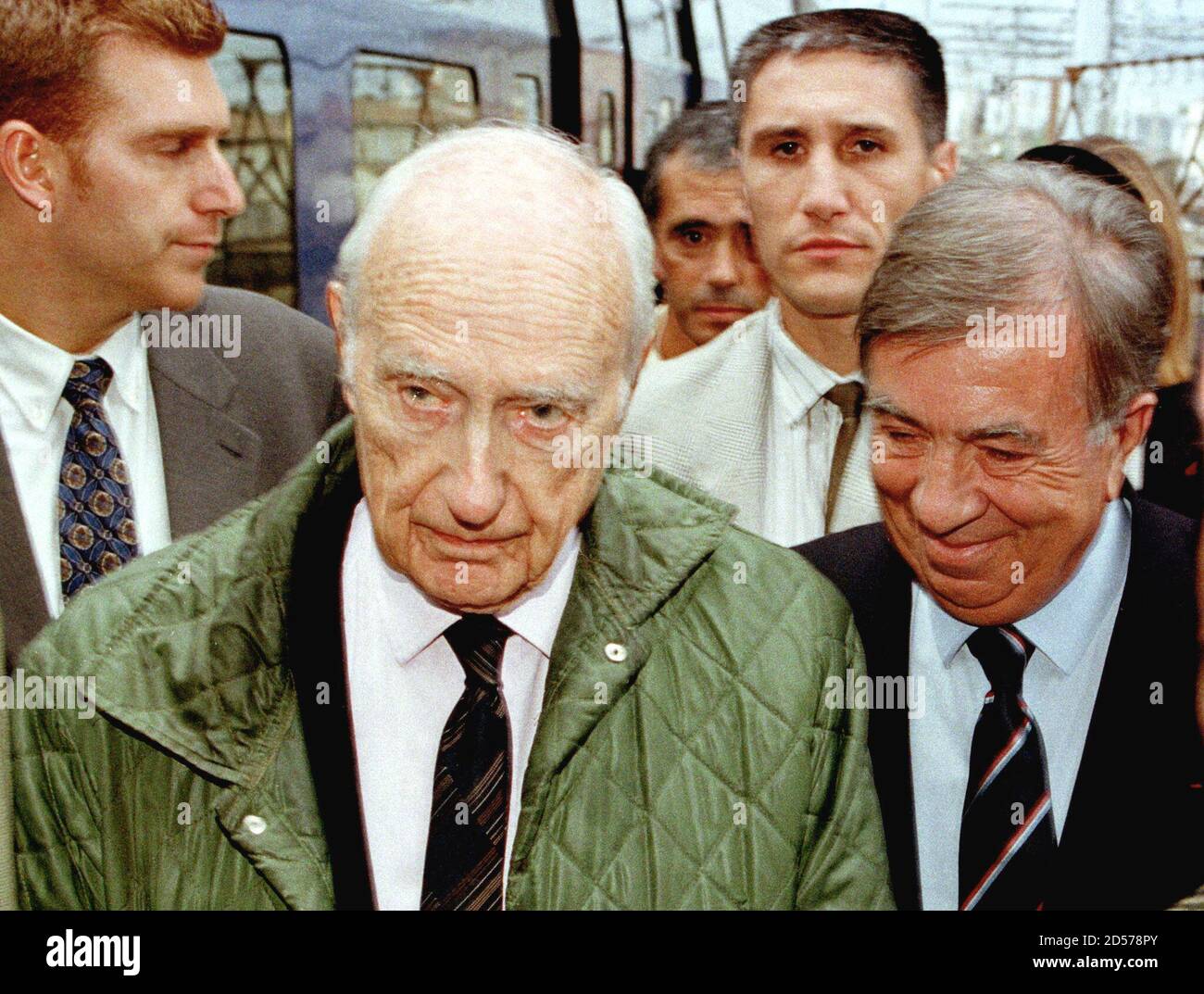Former French cabinet minister and accused wartime collaborator Maurice  Papon (L) arrives at the train station under tight security with his lawyer  Jean-Marc Varaut (R), as he surrenders to police on the