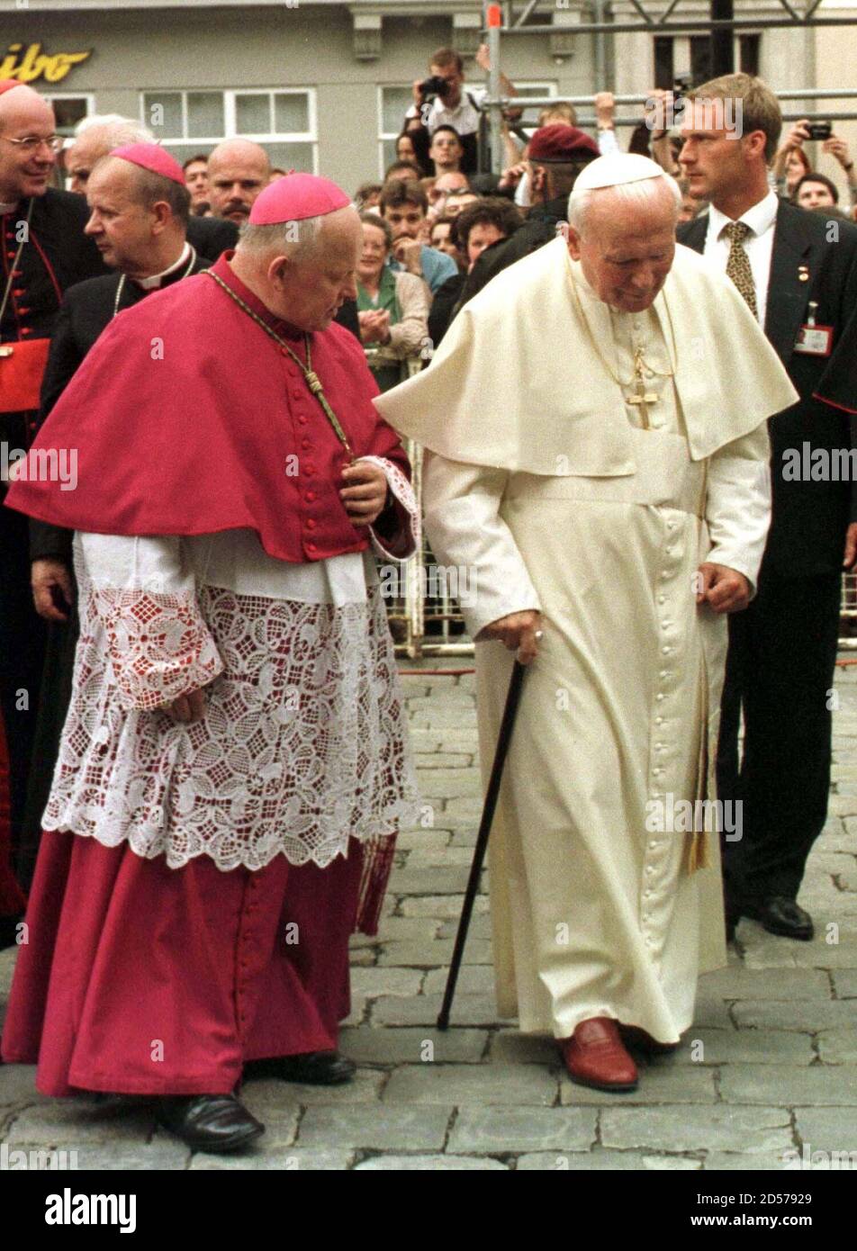 Pope John Paul II (R) and controversial Austrian Bishop Kurt Krenn (L) are  on their way into the Cathedral of St. Poelten June 20. The three-day visit  to Salzburg, St. Poelten and