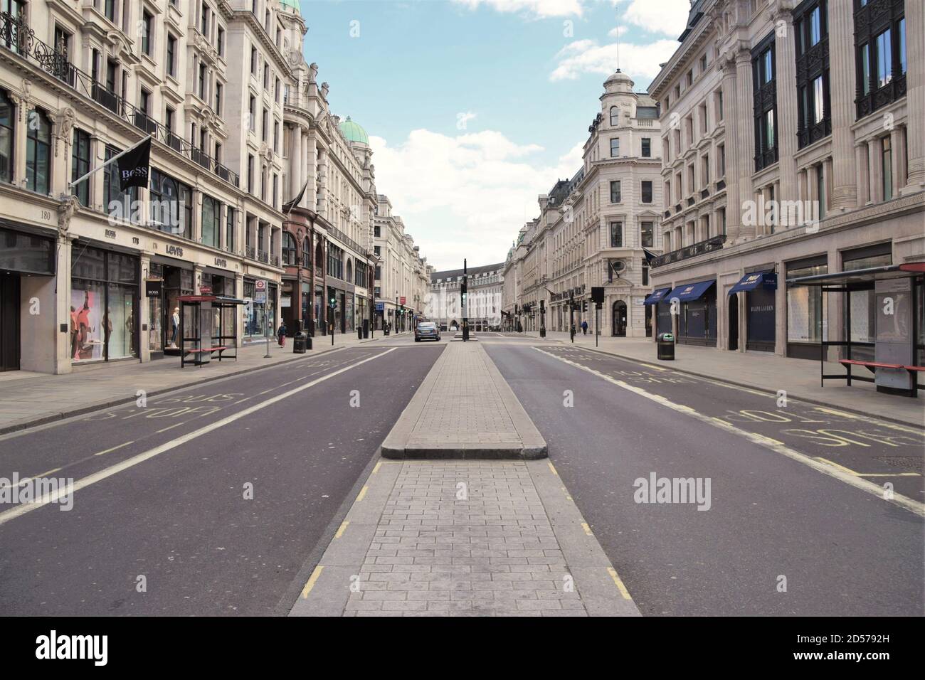 Empty Regent Street during 2020 lockdown. The usually bustling Central London resembled a ghost town as shops and businesses were closed during the coronavirus pandemic. Stock Photo