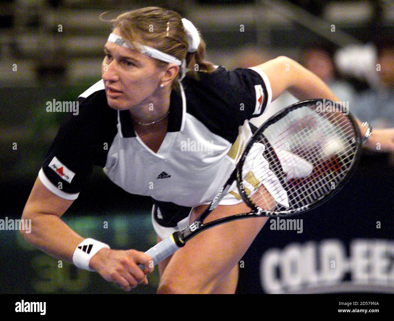 Germany's Steffi Graf follows through on a serve to [Lindsay Davenport]  during their semifinals match at the Chase Championships of the Corel WTA  Tour at New York's Madison Square Garden, November 21.