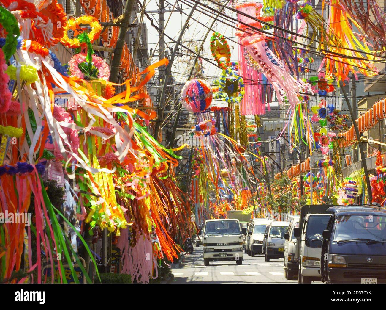 Cars Drive Through A Tunnel Of Paper Decorations Fluttering In The Humid Mid Summer Breeze Put Up In Celebration Of The Tanabata Festival In Tokyo S Downtown Asakusa Area July 7 The Traditional Japanese