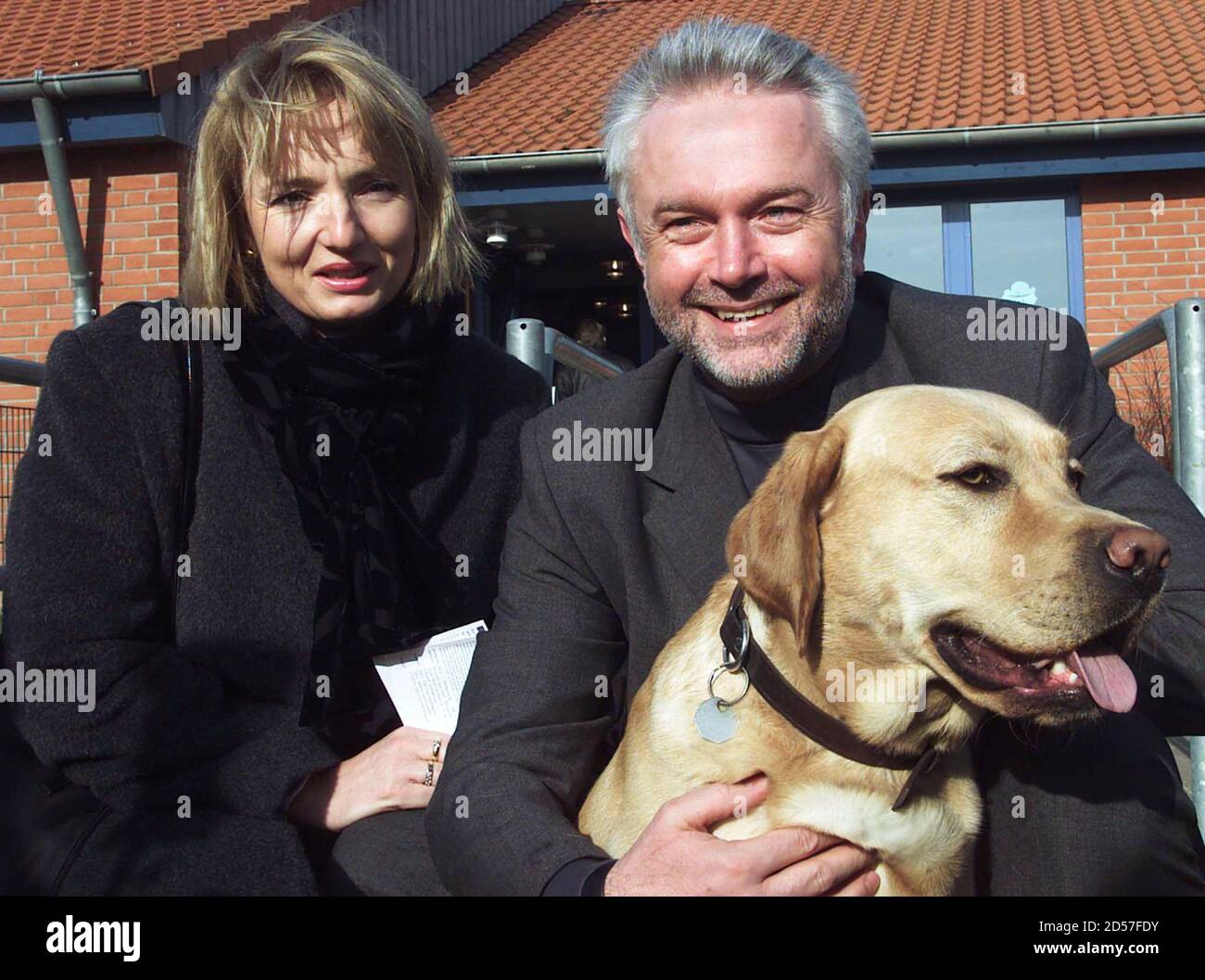 Wolfgang Kubicki Of The Free Democrats Fdp And His Wife Annette Marberth Kubicki Pose With Their Dog Bogart Outside A Kindergarten Where They Cast Their Vote In The Coastal Village Of Strande