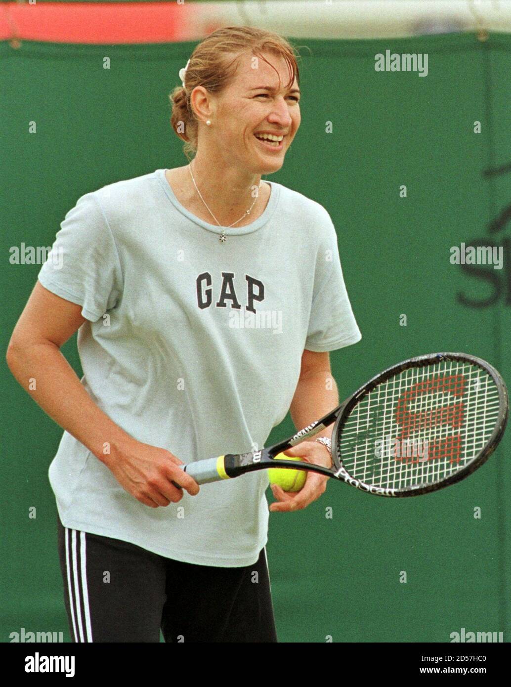 German tennis star Steffi Graf smiles during a practice session at the  grasscourt championships at Devonshire Park June 16. Graf, back on the  tennis scene after her recovery from a knee injury