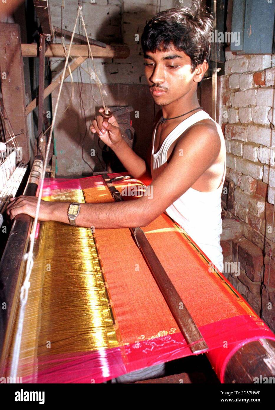 A Weaver Works On A Silk Saree In The Northen Indian City Of Varanasasi November 6 The Silk Industry In Varanasi Is Famous For Making Banarasi Sarees Which Sell For 3 000 Rupees alamy