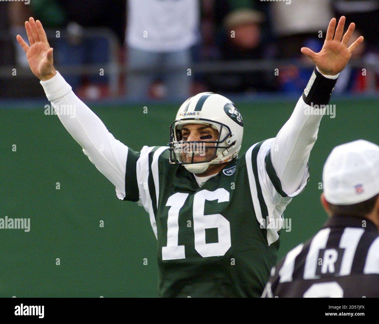 New York Jets quarterback Vinny Testaverde celebrates his second quarter  touchdown pass to running back Curtis Martin during the Jets' game against  the New England Patriots at Giants Stadium in East Rutherford,