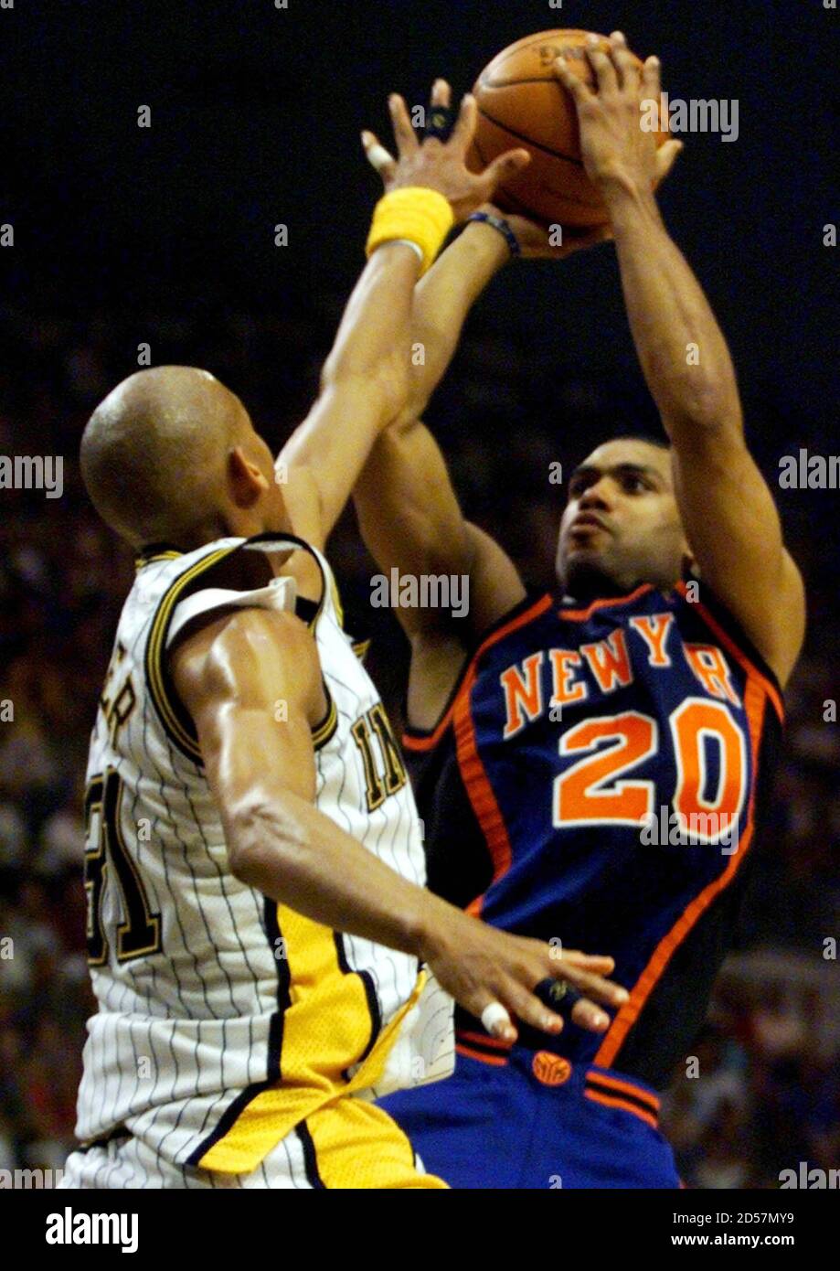 New York Knicks' Guard Allan Houston (R) Shoots Over Indiana Pacers' Guard Reggie Miller (L) May 30 During Game One Of The Nba Eastern Conference Finals At Market Square Arena In Indianapolis.