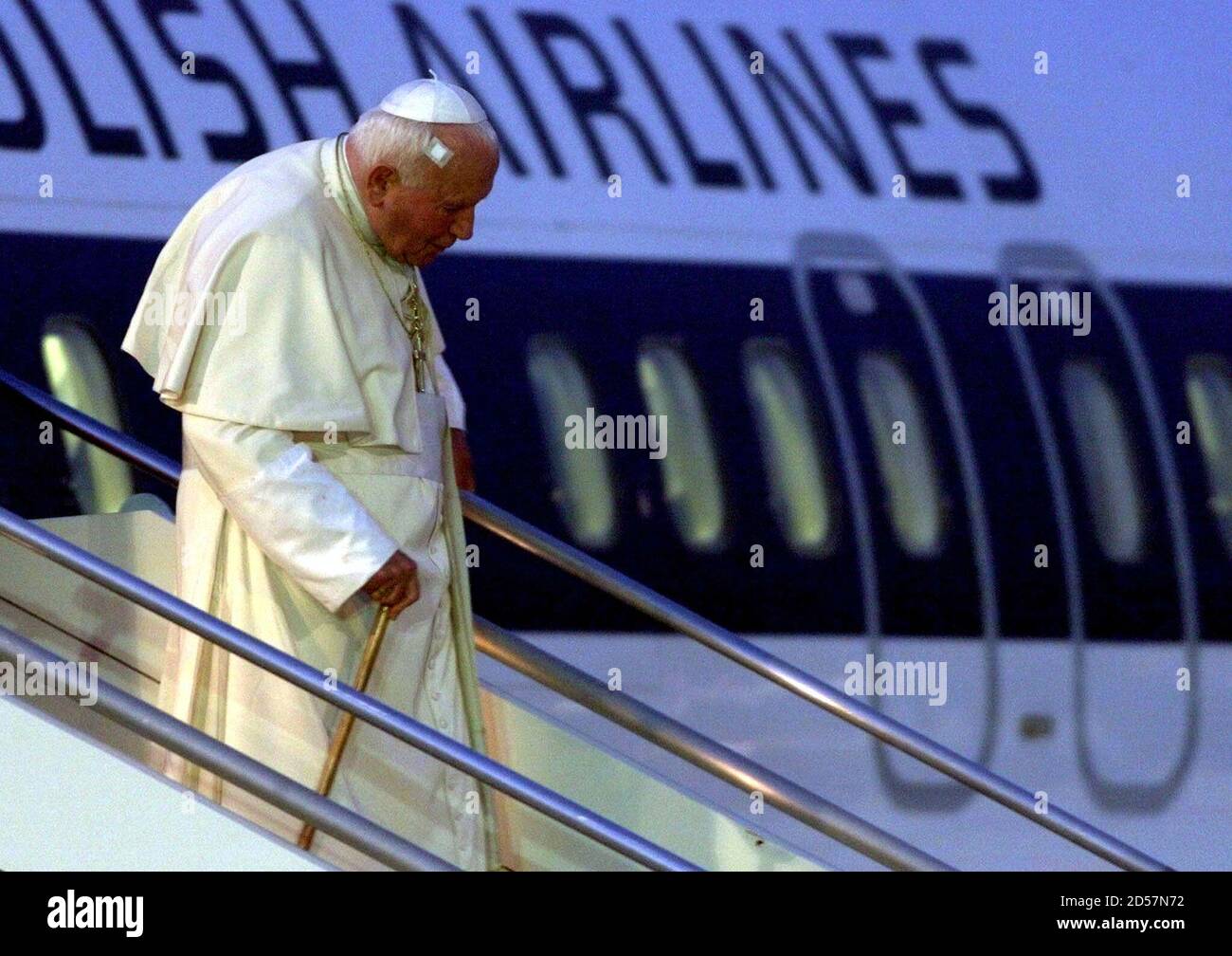 Pope John Paul II walks out from the plane as he arrives at Rome's Ciampino  airport at the end of his trip to Poland June 17. The health scares during  the trip