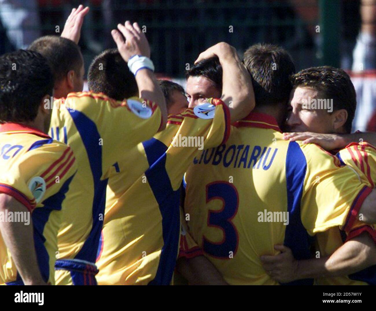 Early celebration for Romania's Viorel Moldovan (C) who is mobbed by team mates after scoring against Germany during their group A match of the European Championship.  RUS Stock Photo