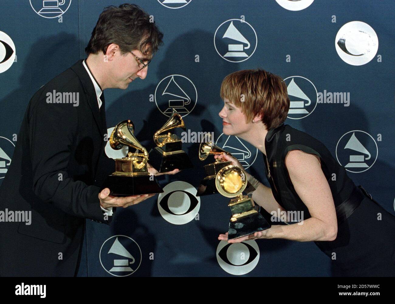John Leventhal and Shawn Colvin bow with their Grammy awards which they won during the 40th