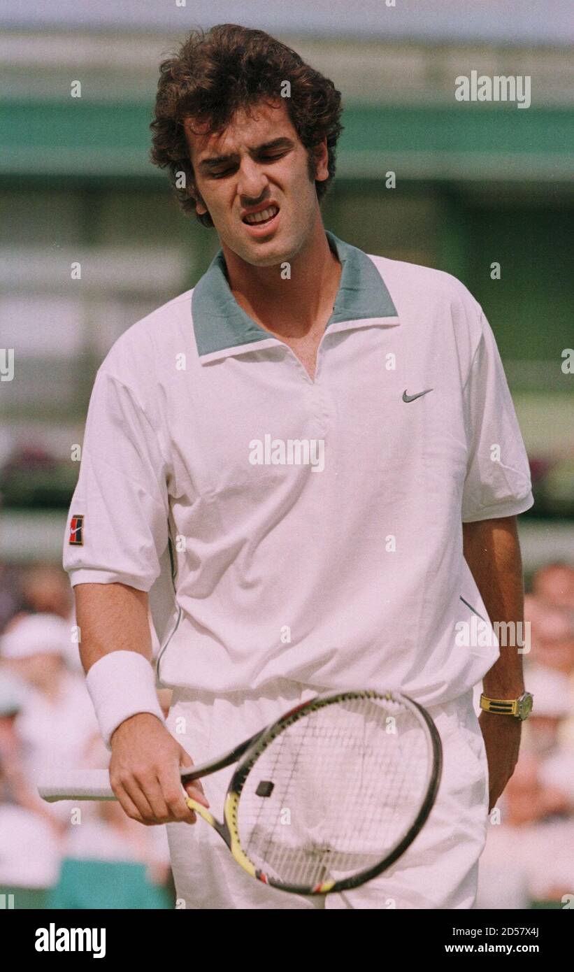 France's Cedric Pioline reacts after losing a point during his match  against Switzerland's Marc Rosse at the Wimbledon tennis championships June  24. Rosset won the match 6-4 3-6 4-6 7-6(7-5) 13-11. JB Stock Photo - Alamy