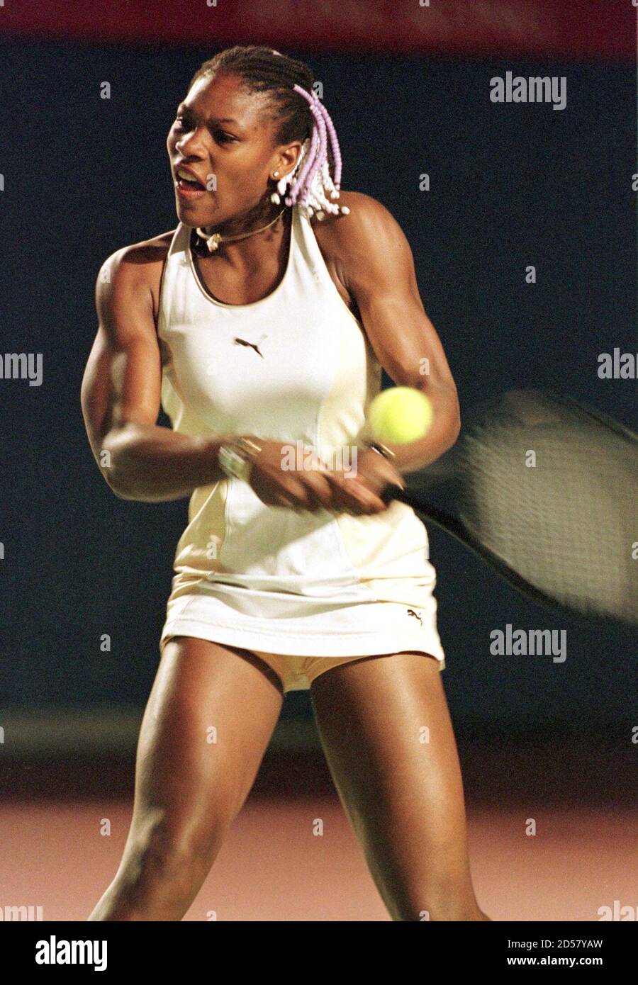 USA's Serena Williams returns the ball to Thailand's Tamarine Tanasugarn in the first match of the 'Super Power' Challenge Cup in Hong Kong January 7. Williams won 6-2 6-1.  LC/CC Stock Photo