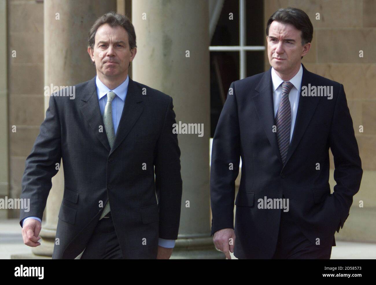 Prime Minister Tony Blair (L) walks alongside Northern Ireland Secretary Peter Mandelson apon his arrival at Hillsborough Castle, County Down, Northern Ireland, April 18. Blair, who flew in on a one-day visit, will hold talks with both Roman Catholic and Protestant party leaders to assess the current logjam in the peace pact he helped launch two years ago.  PM Stock Photo