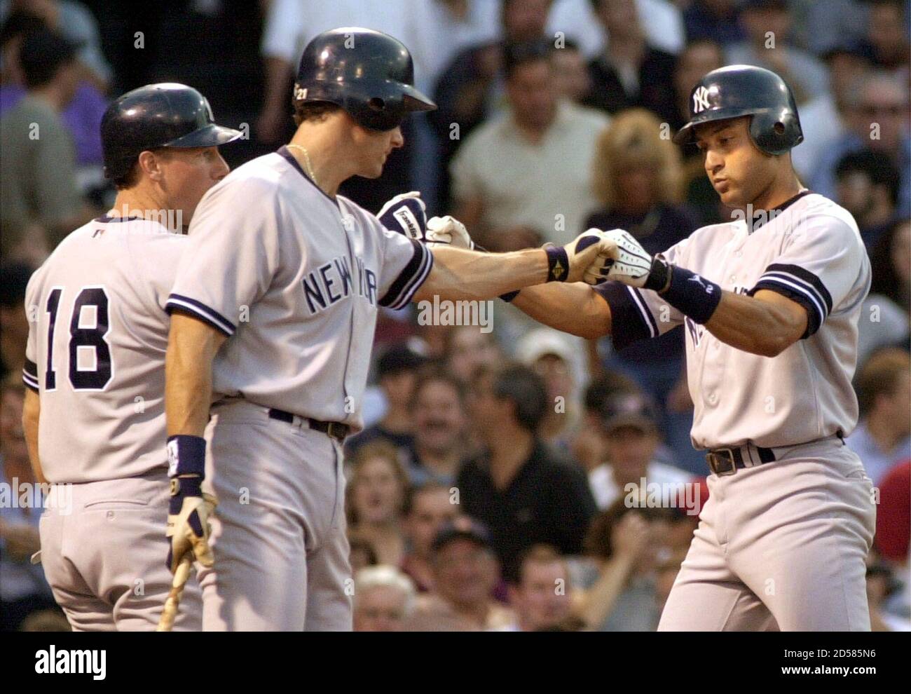 New York Yankees Scott Brosius L And Tino Martinez C Congratulate Teammate Derek Jeter R At Home Plate After Jeter Hit A Two Run Home Run Against The Boston Red Sox In The