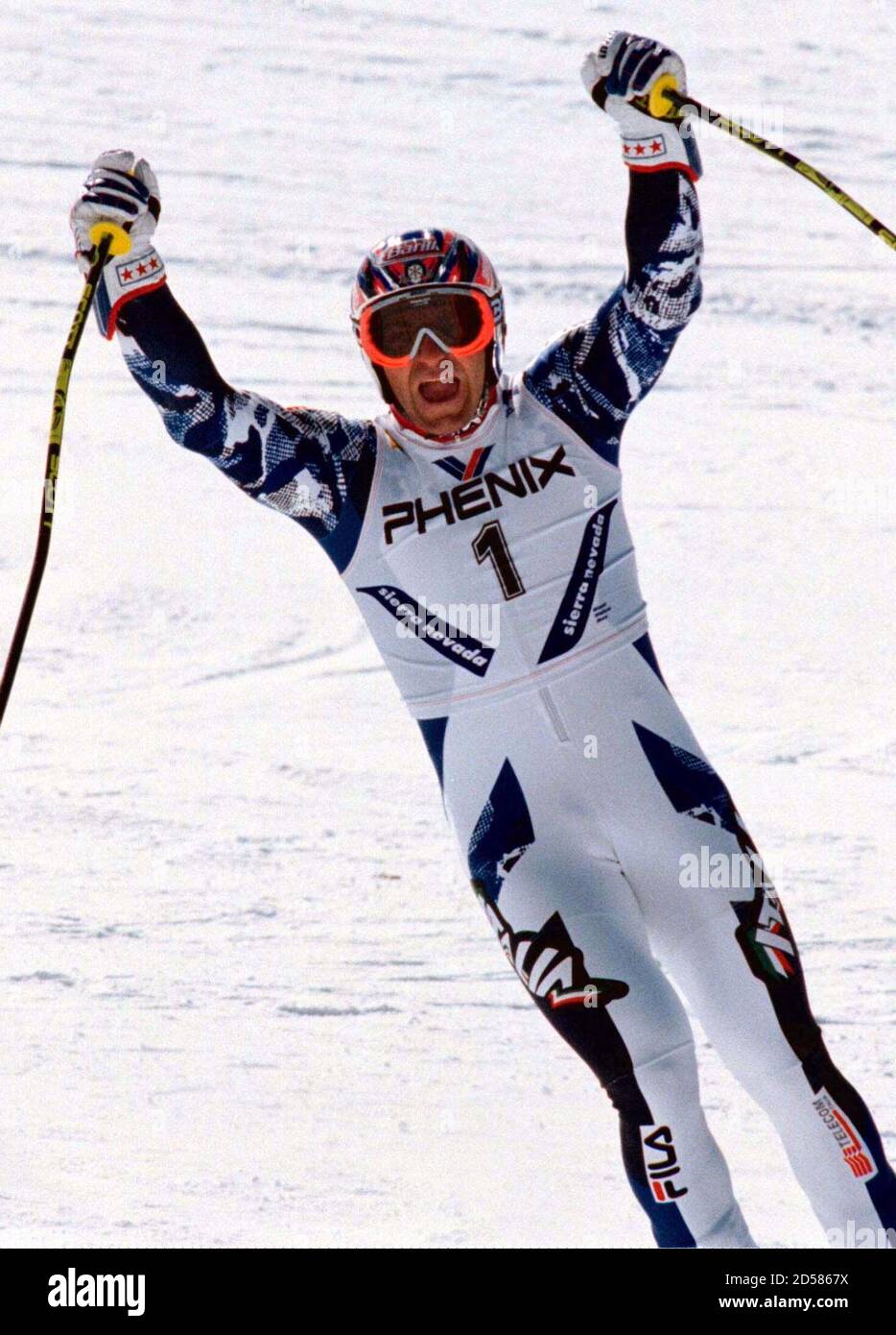 Italian ski king Alberto Tomba celebrates after crossing the finish line to  win the men's giant slalom race in the Alpine skiing world championships  February 23. Tomba, the most succesful Alpine skier