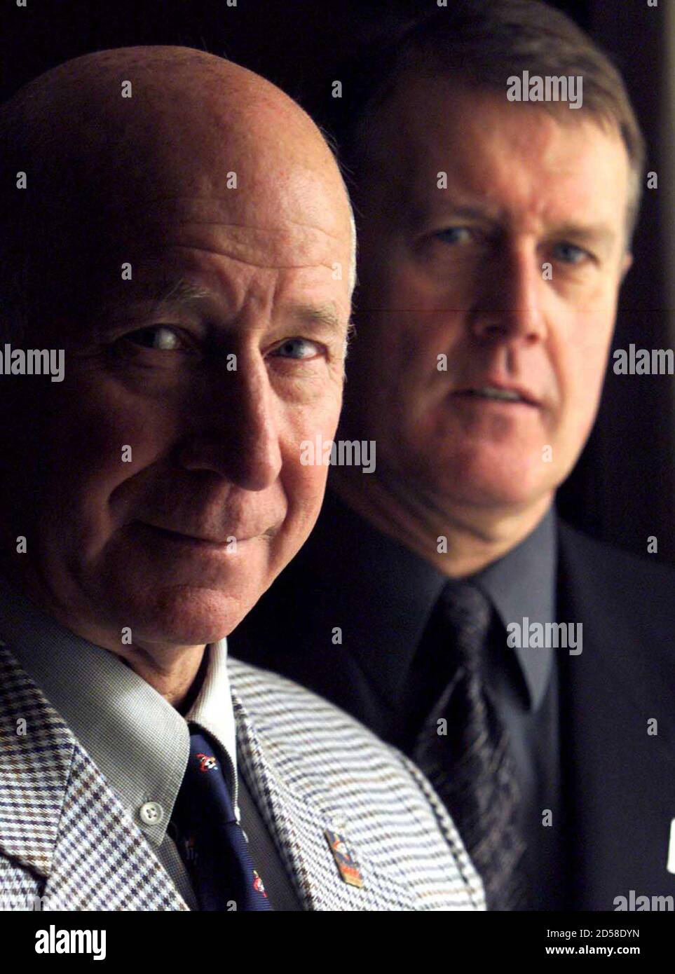 Football legends Sir Geoff Hurst (R) and Sir Bobby Charlton arrive at