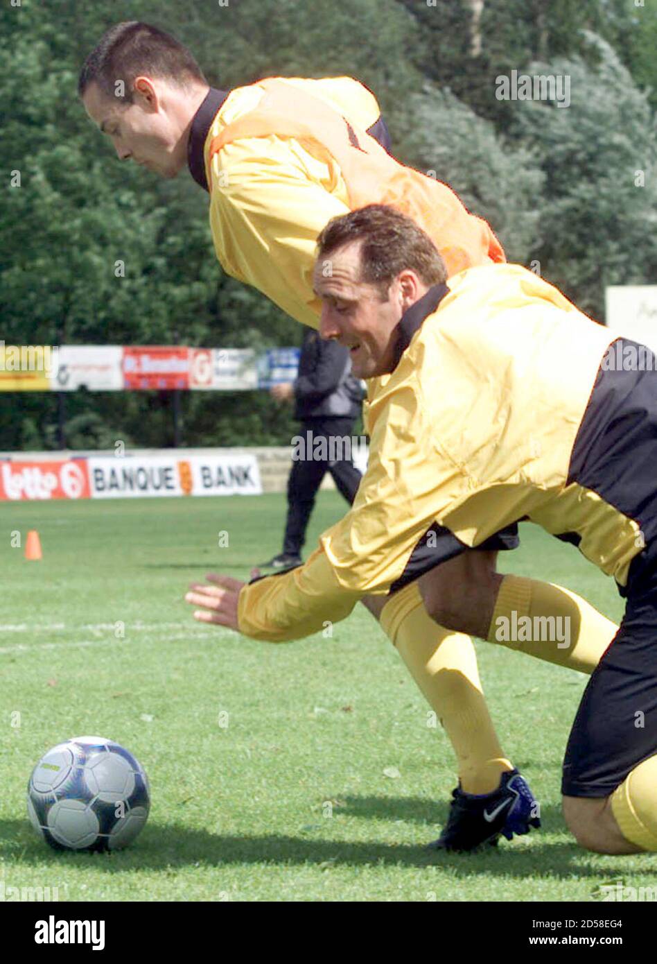 Belgian National Team Soccer Player Gilles De Bilde L From The Sheffield Club Disputes The Ball With Yves Vanderhaeghe From Moucron Team During A Training Session At De Panne Northern Belgium May