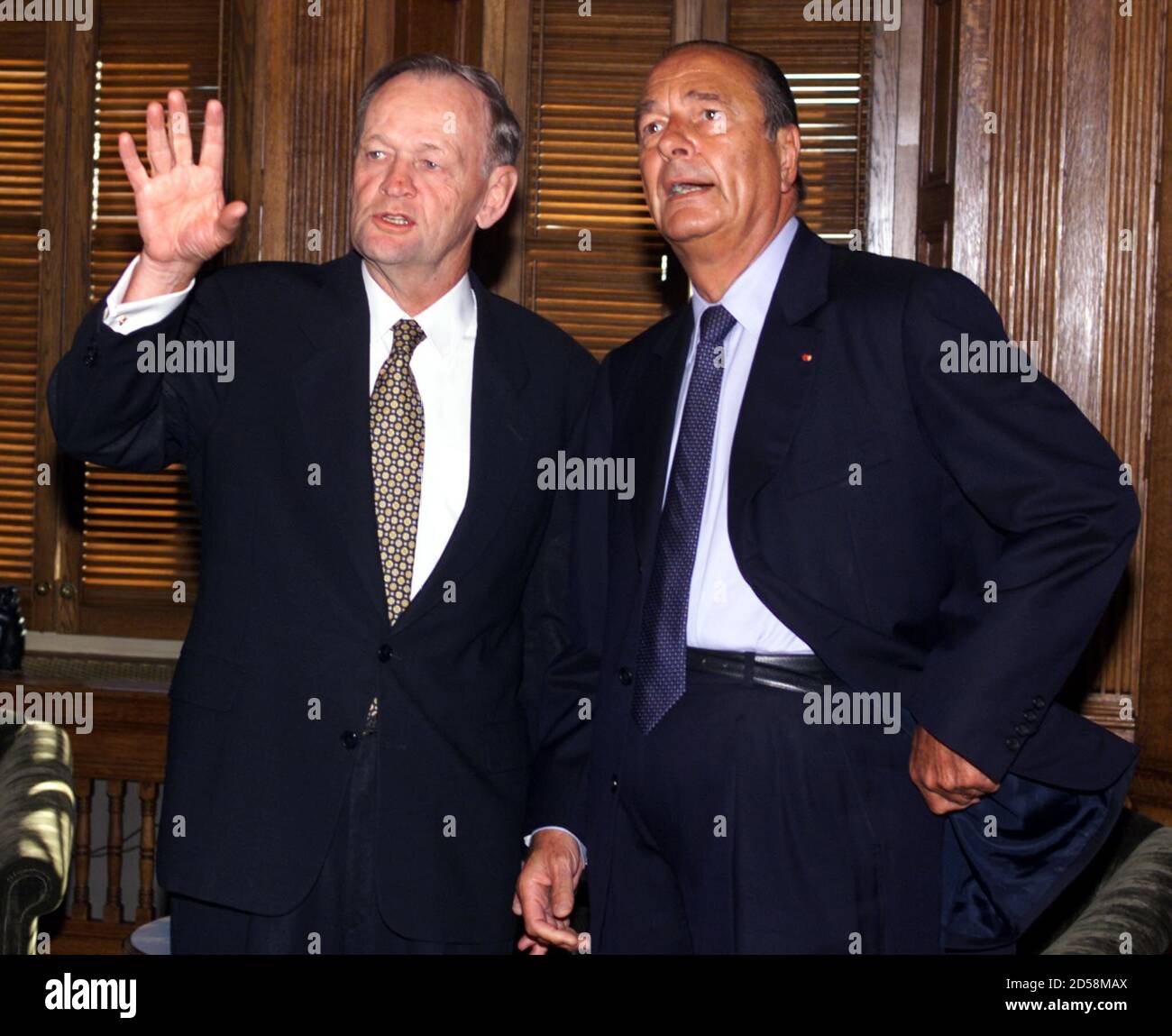 Canadian Prime Minister Jean Chretien L Gestures As He Speaks With French President Jacques Chirac R Prior To A Bilateral Meeting In Otawa September 1 Chirac Is In Ottawa On His Way