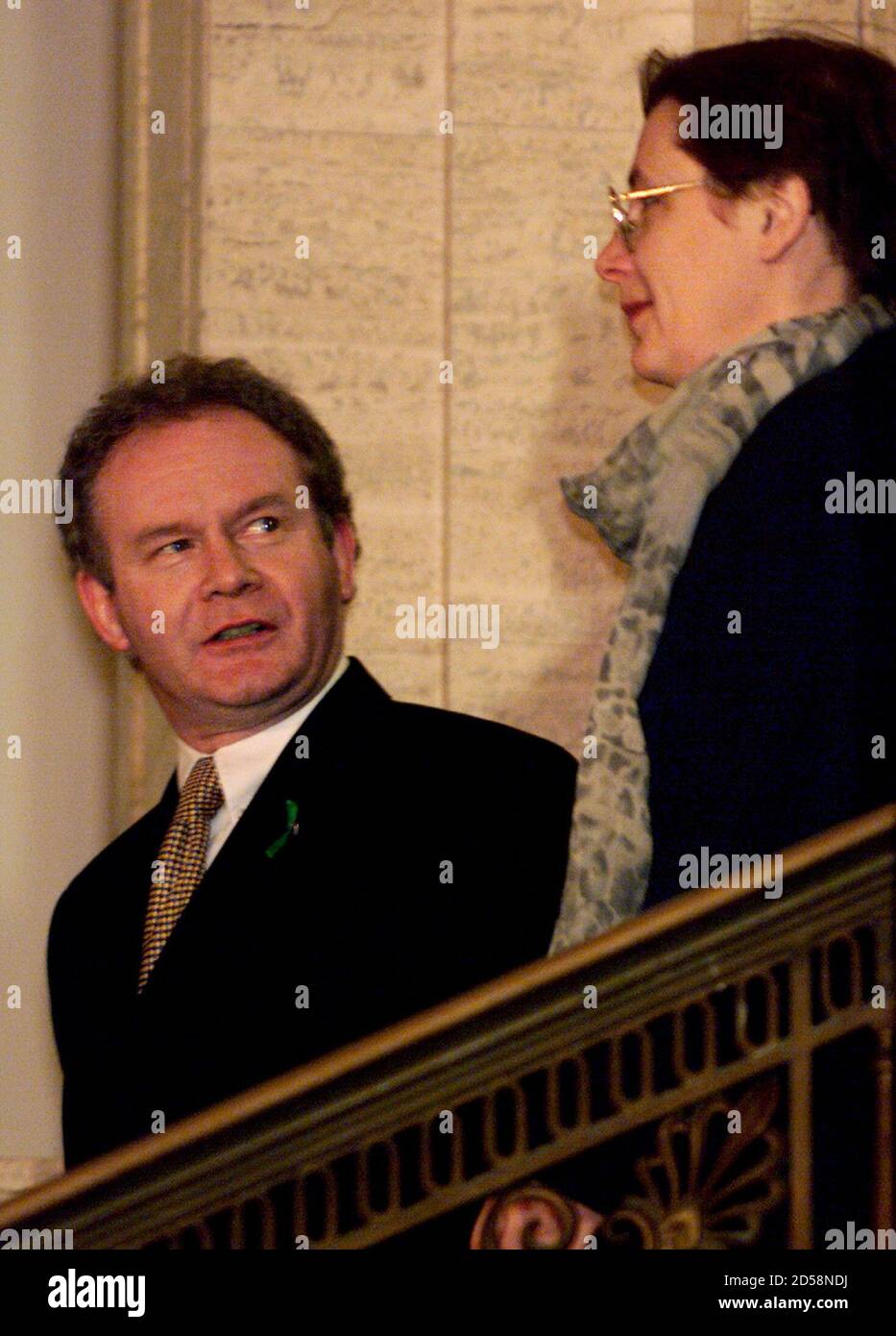 Sinn Fein's Martin McGuinness (L) and Bairbre de Brun walk towards the Assembly at Stormont Building, Belfast November 29. Protestant and Roman Catholic parties nominated ministers to a coalition government of pro-Irish Republicans and pro-British Unionists which will become fully operational on Thursday, when London will hand over power.  FP/FMS Stock Photo