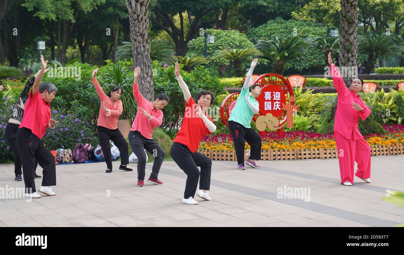 Nanning. 13th Oct, 2020. Citizens exercise at Nanhu Park in Nanning of south China's Guangxi Zhuang Autonomous Region, Oct. 13, 2020. TO GO WITH 'Across China: 'Sponge city' program bears fruit' Credit: Guo Yifan/Xinhua/Alamy Live News Stock Photo