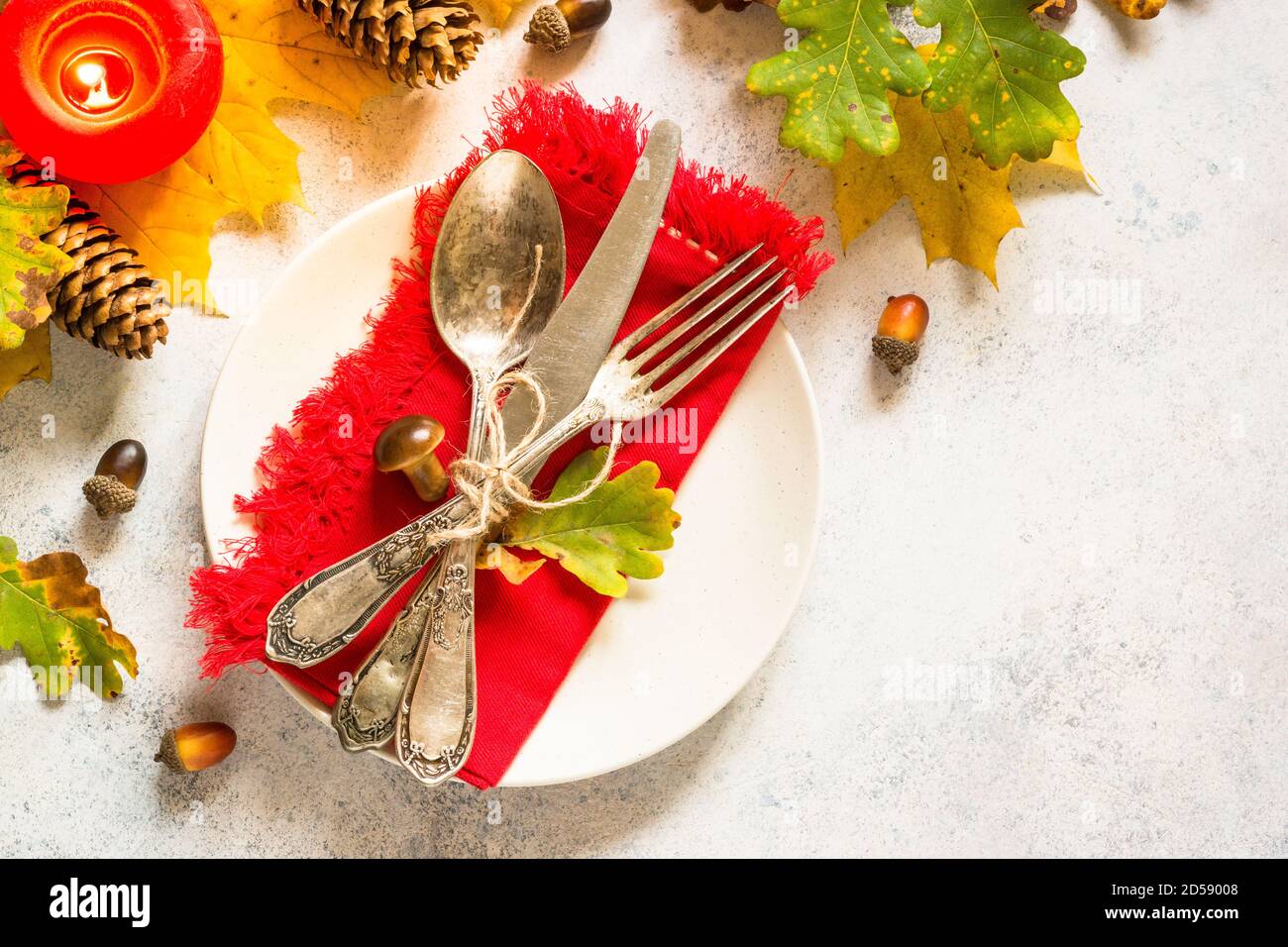 Autumn table setting top view at white table. Stock Photo