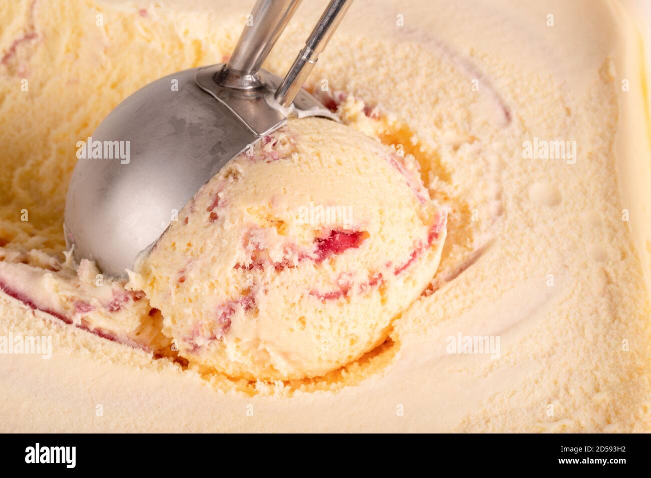 Close up of some raspberry ripple ice cream being served. Stock Photo