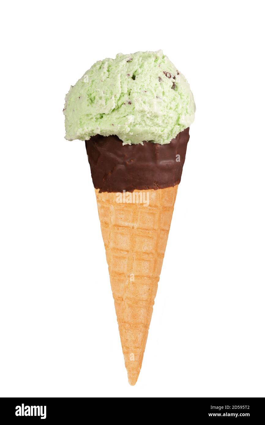 Mint choc chip ice cream in a chocolate dipped cone. Stock Photo