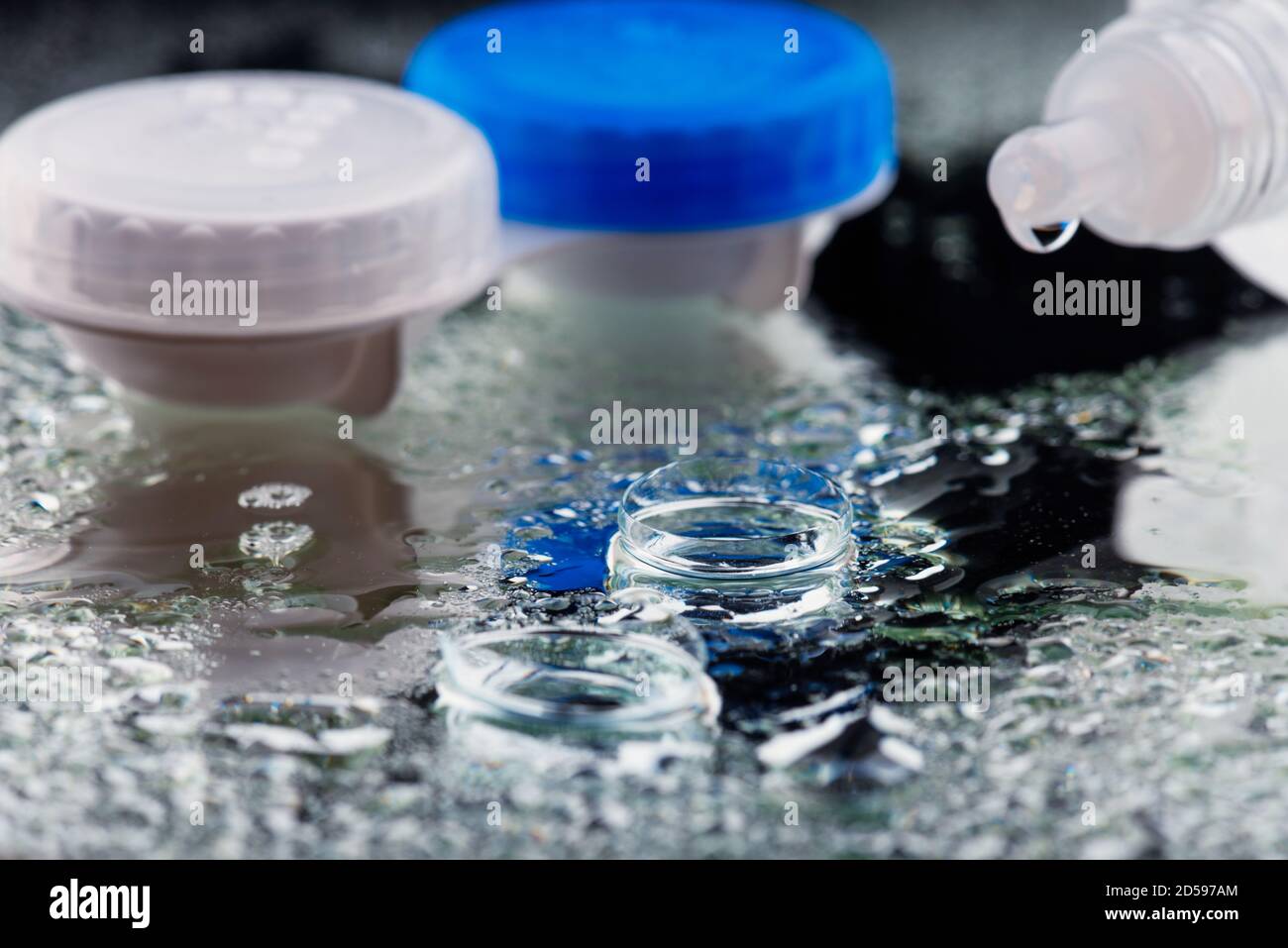 Contact lens, case and bottle of solution Stock Photo