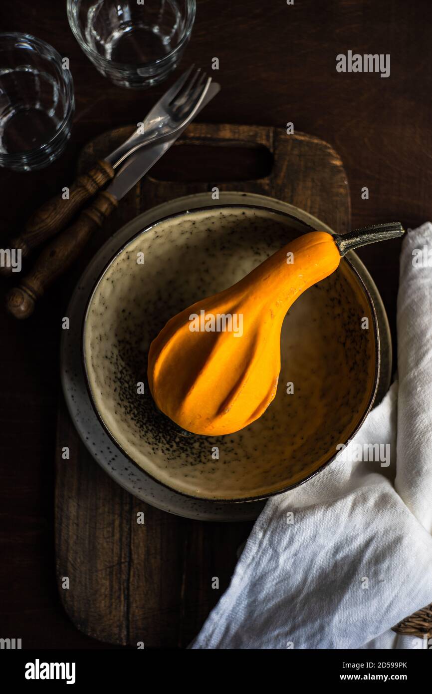 Rustic place setting on a table for Thanksgiving Stock Photo