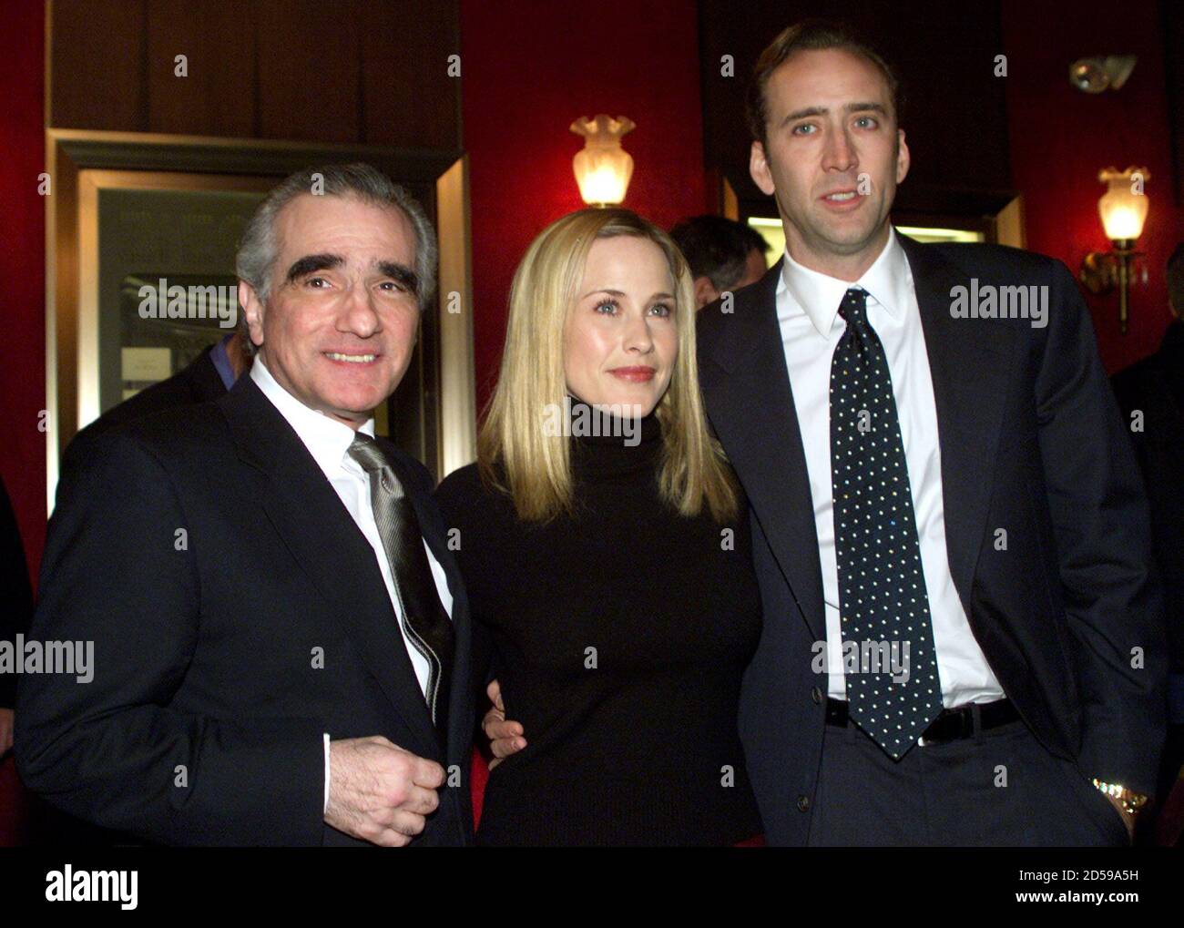 Actors Nicolas Cage (R) and Patricia Arquette pose with director Martin  Scorsese (L) at the world premiere of the new Paramount Pictures film  "Bringing out the Dead" at the Ziegfeld Theater in