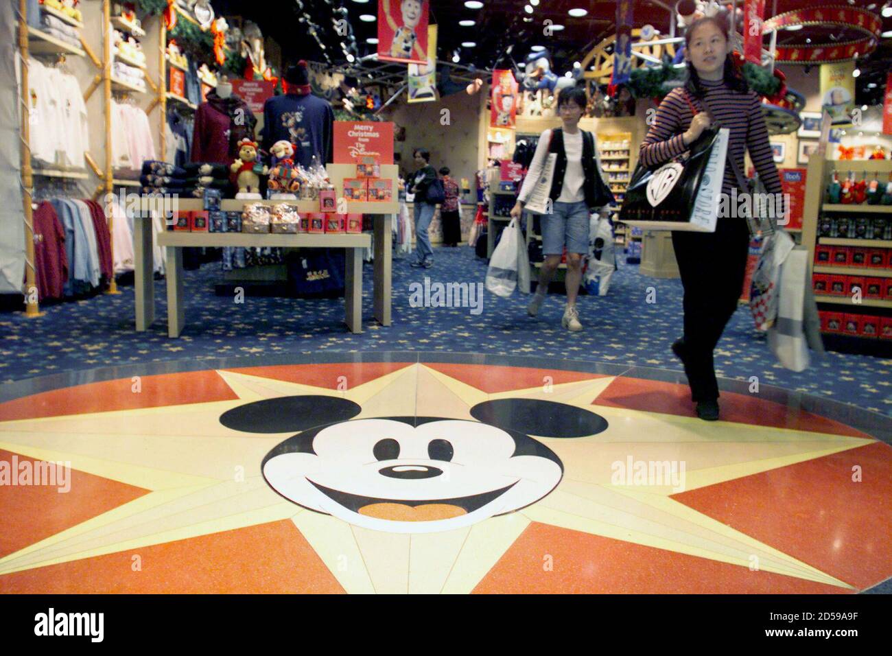Customers Visit A Disney Store In Hong Kong November 1 Hong Kong Looks Set To Land Its Dream Deal With The Walt Disney Company To Build A Multi Billion Dollar Theme Park And Tourist