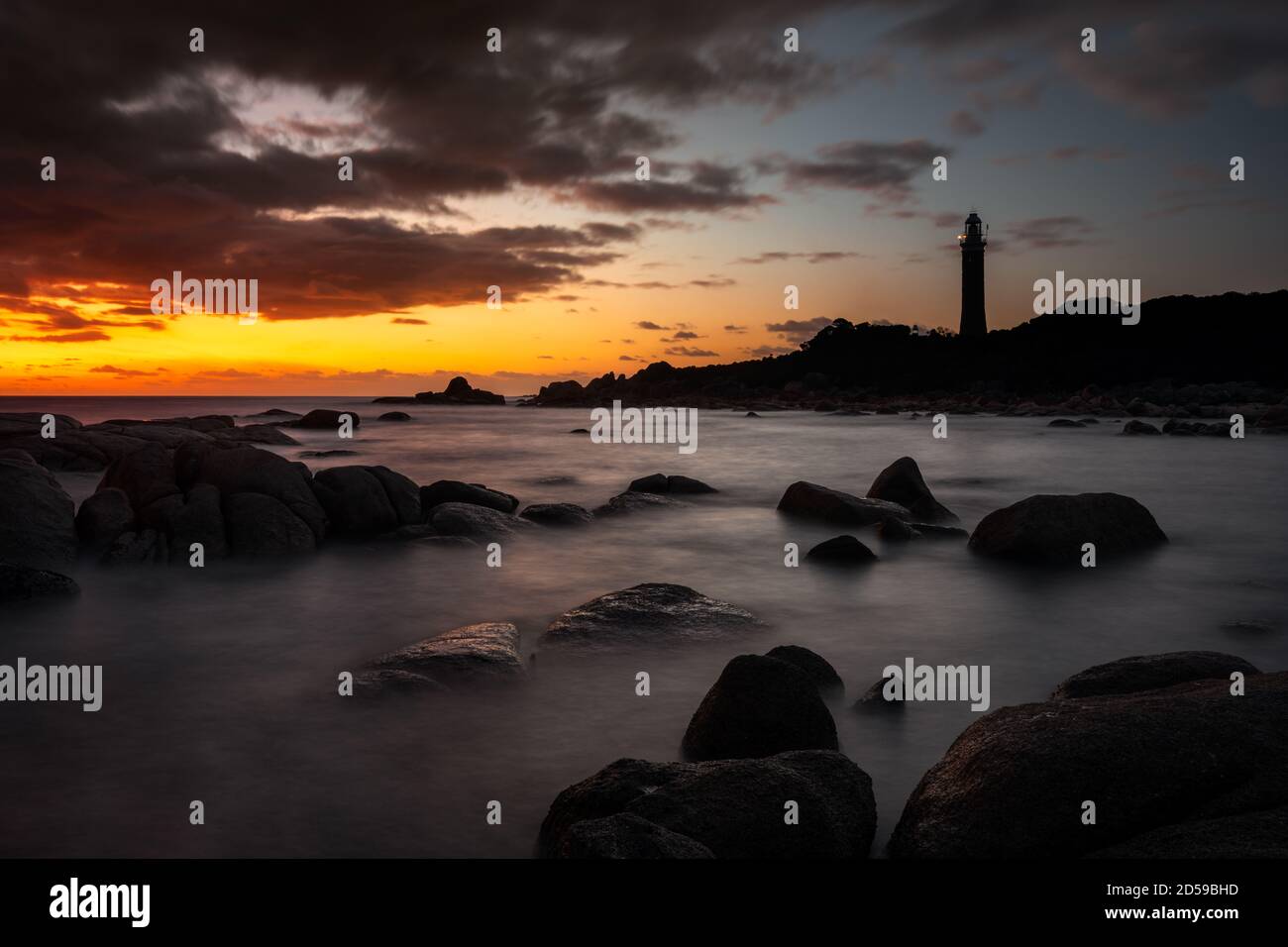 Sunrise at Eddystone Point Lighthouse. Stock Photo
