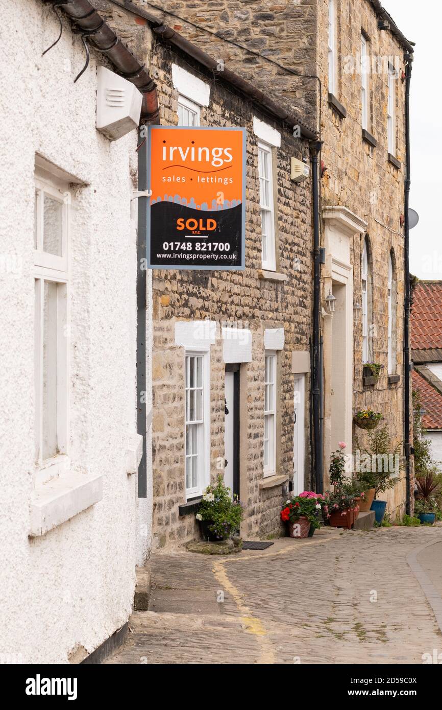 Sold sign outside property in the market town of Richmond, North Yorkshire, England, UK - during coronavirus pandemic 2020 Stock Photo