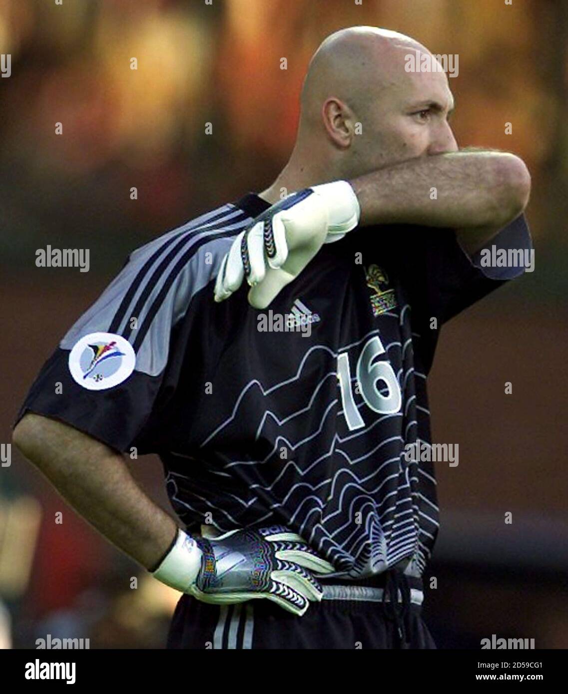French Goalkeeper Fabien Barthez Wipes His Face After Portugal S Nuno Gomes Scored The Opening Goal During A European Championship Semi Final Match In Brussels June 28 Ih Joh Stock Photo Alamy