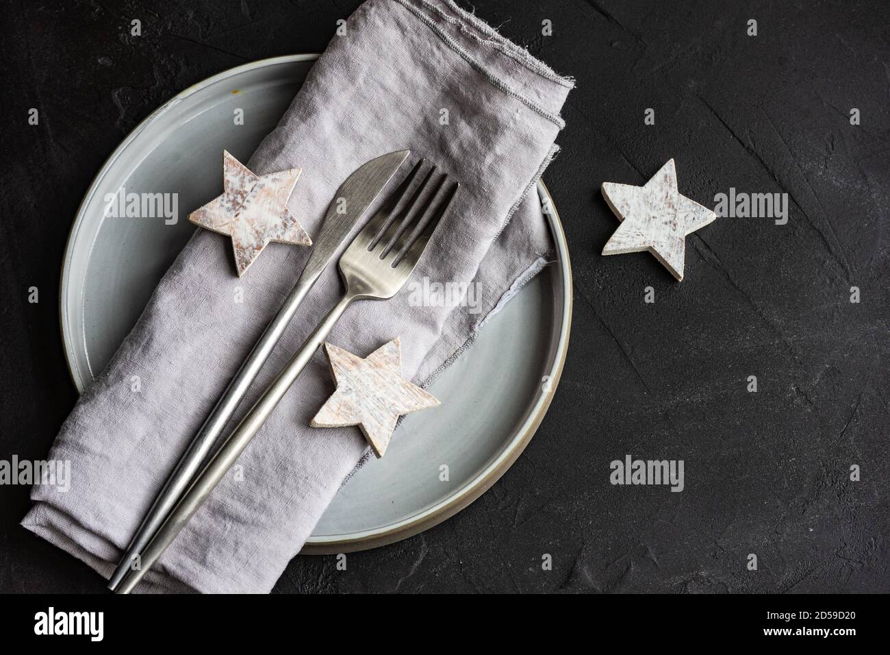 Christmas place setting with star decorations Stock Photo