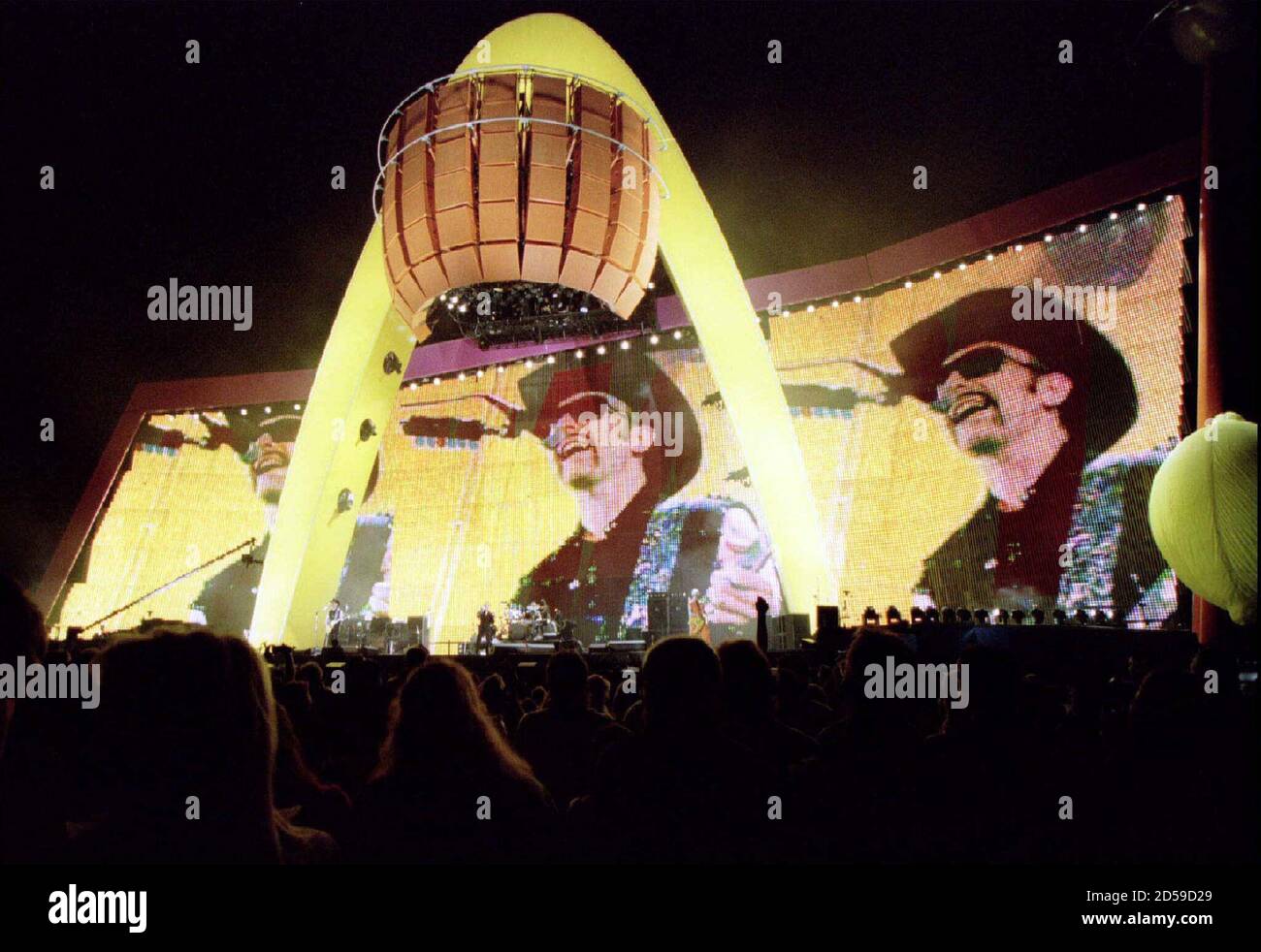 A sell-out crowd watches U2 start their "Popmart" tour at the Sam Boyd  Stadium April 25 in Las Vegas. The image of guitarist "Edge" is shown live  on a 150-by-50-foot video screen